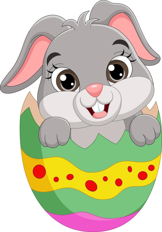Cartoon easter bunny inside a cracked easter egg vector