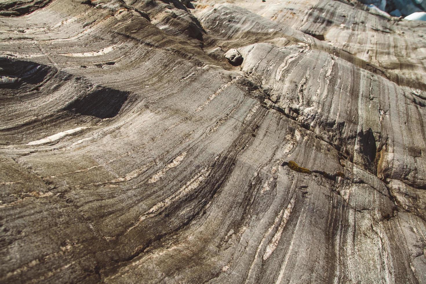 Stone texture from waves erode, nature background. Top view. Copy space. Can use as banner photo