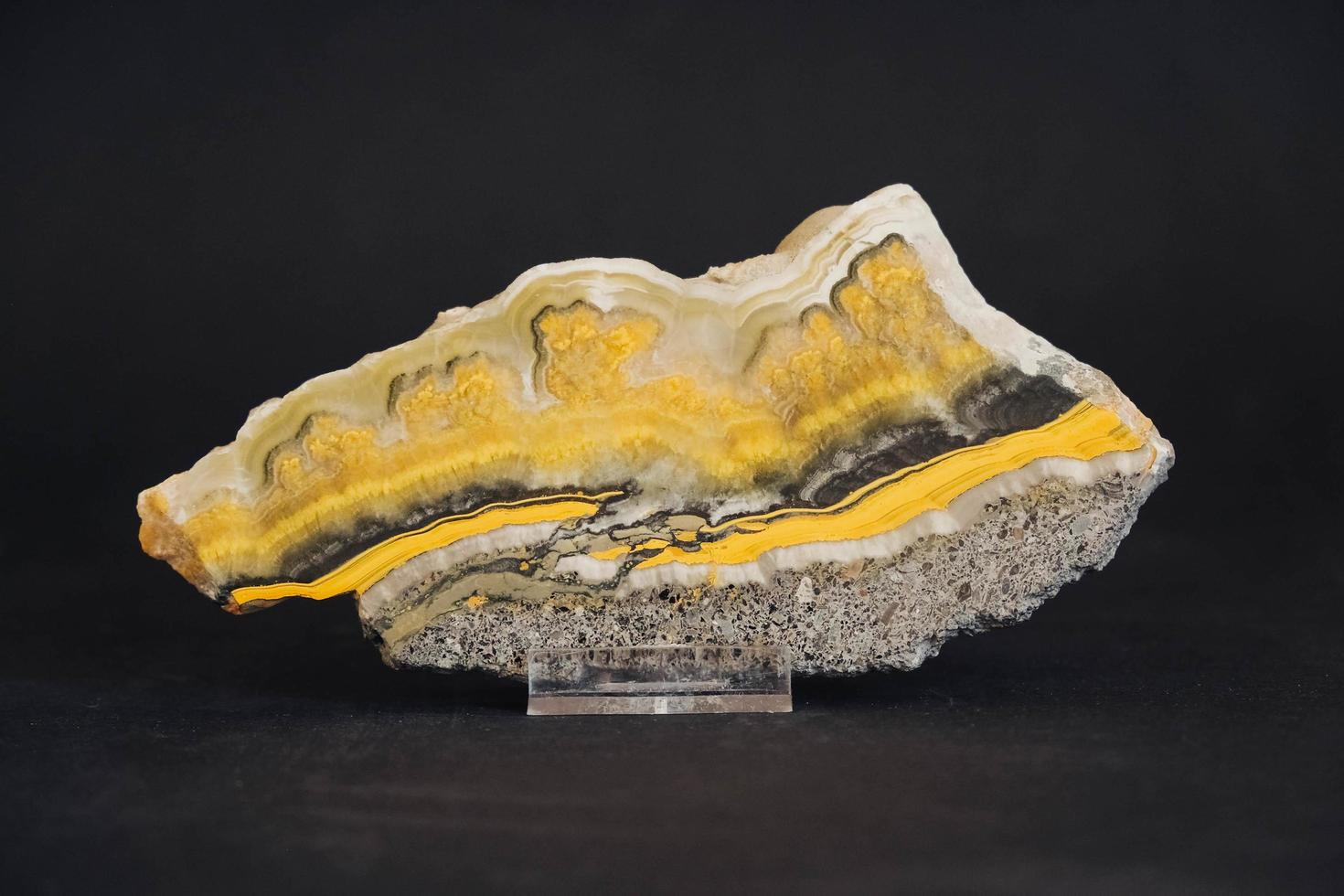 Bamblbee jasper stone on black background photo