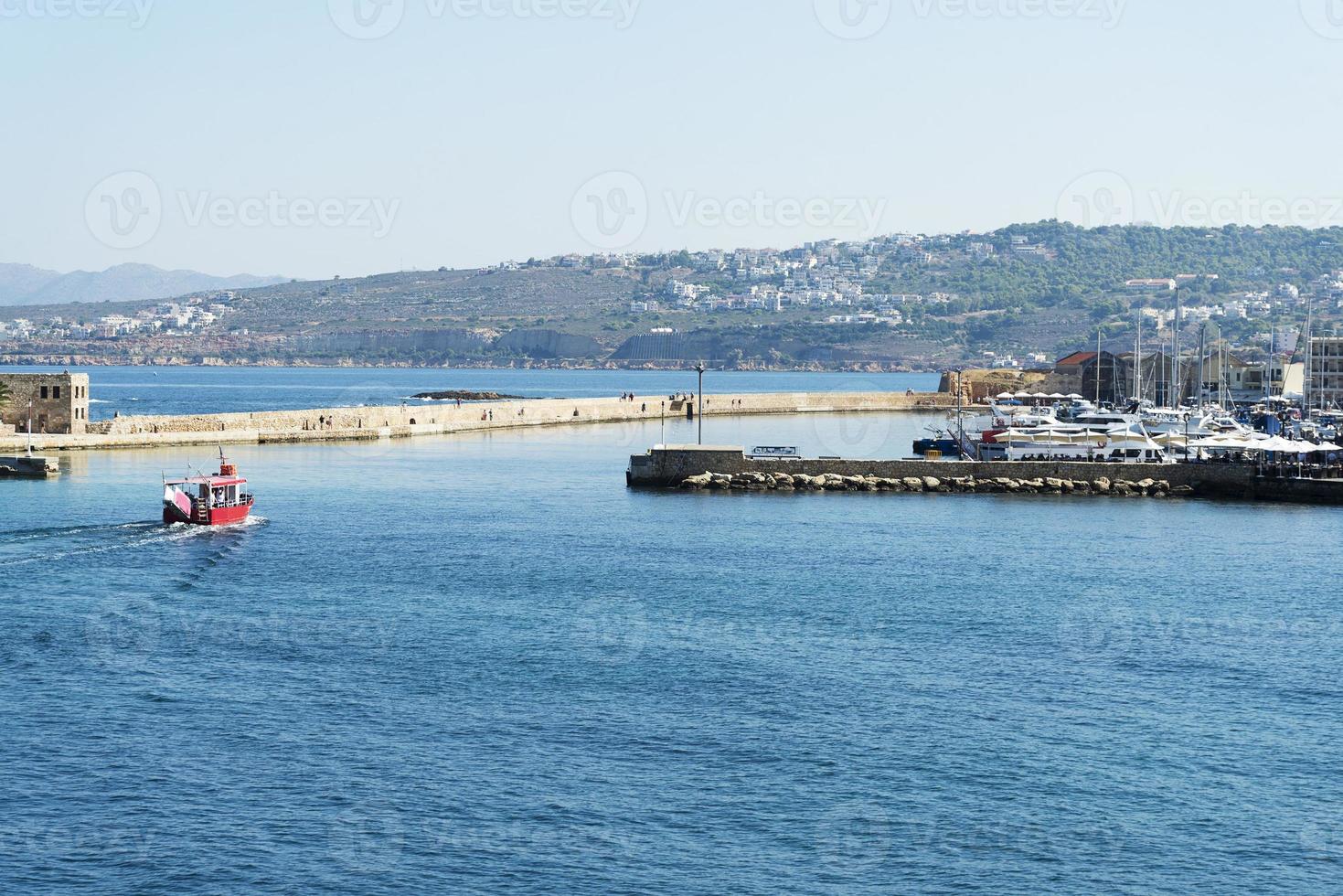 the boat enters the port of the city. The island of Crete. photo