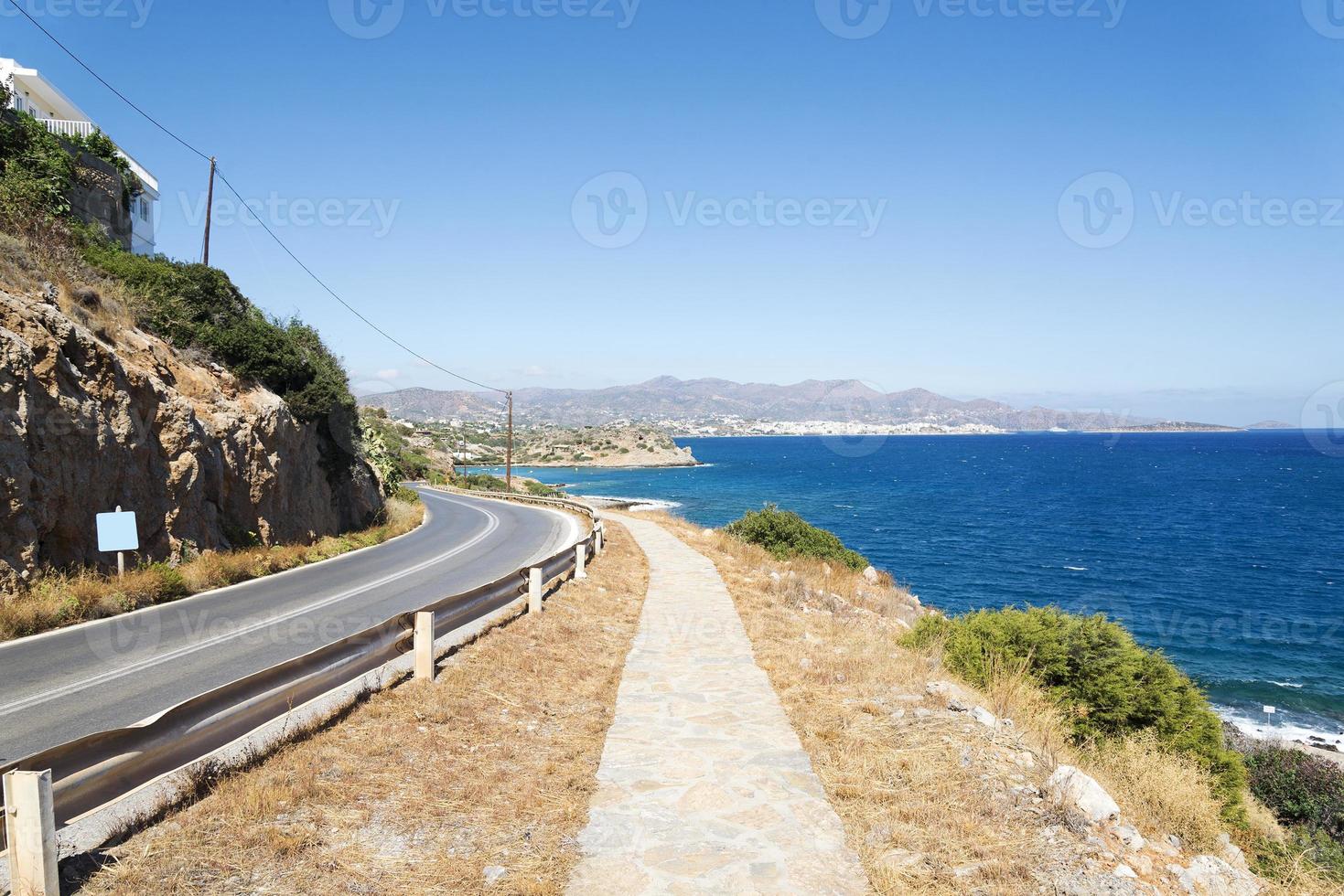 The road along the beautiful beaches on the coast of the island of Crete. photo