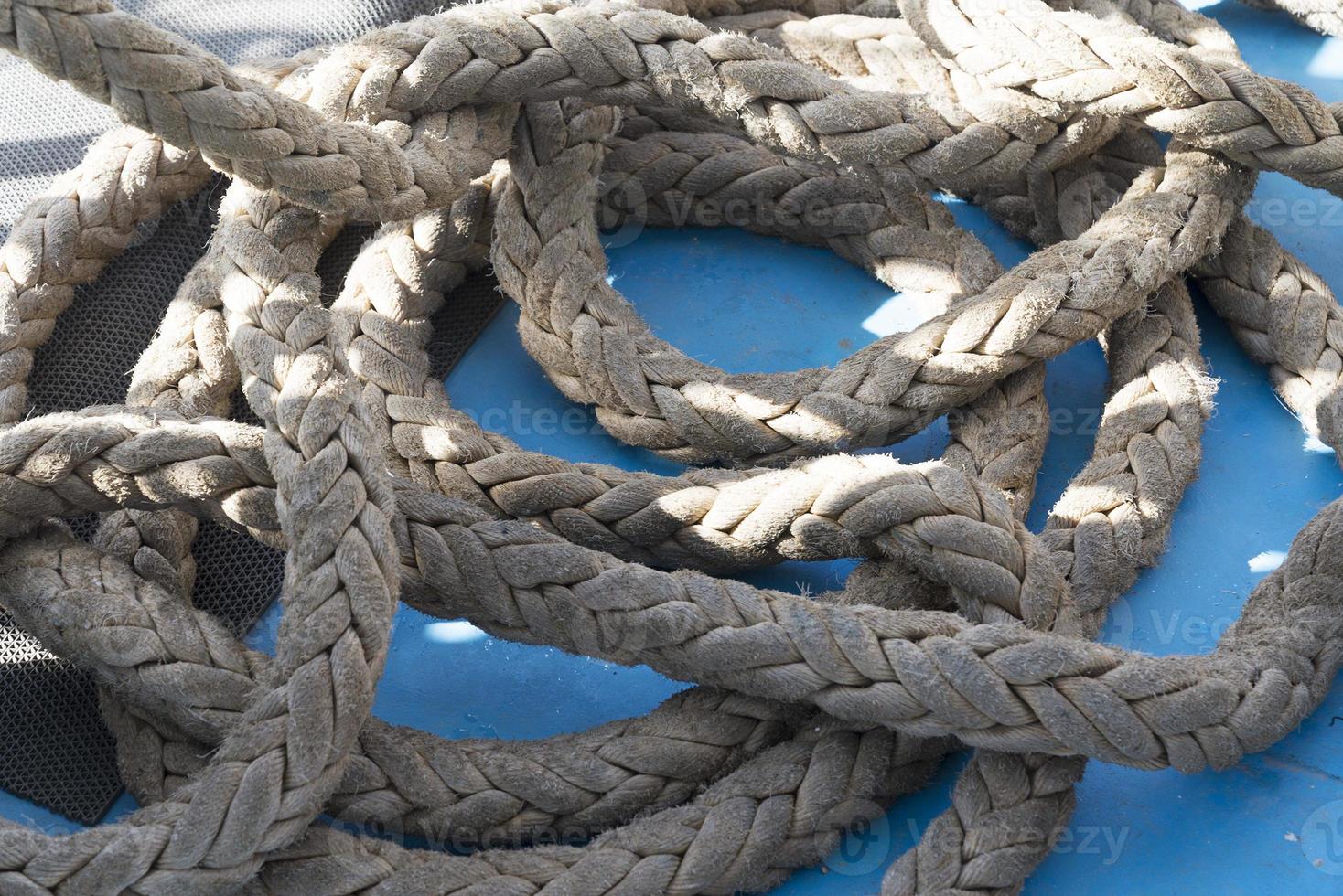 rope closeup on blue background. photo