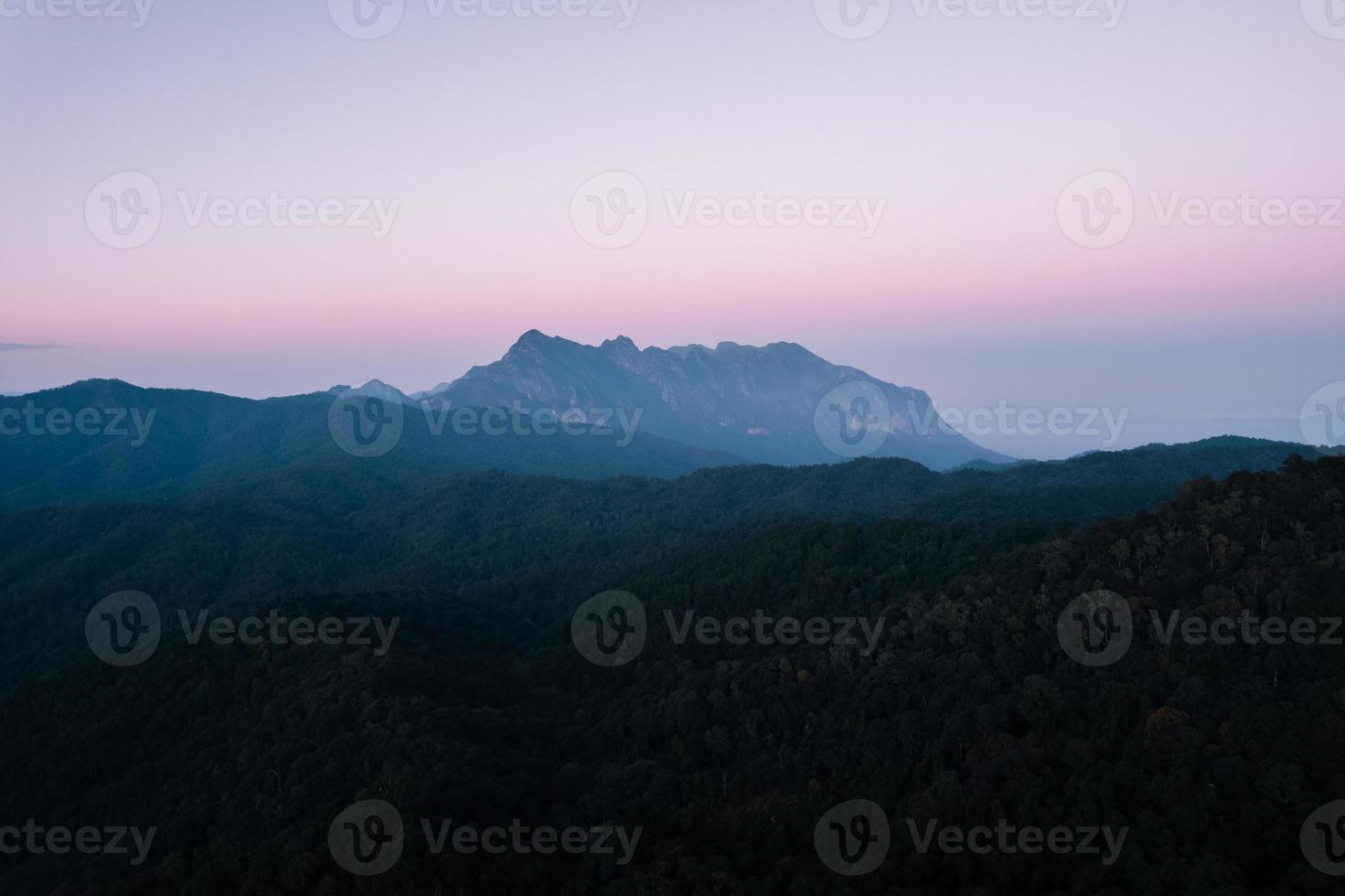 evening mountain view sunset and purple twilight photo