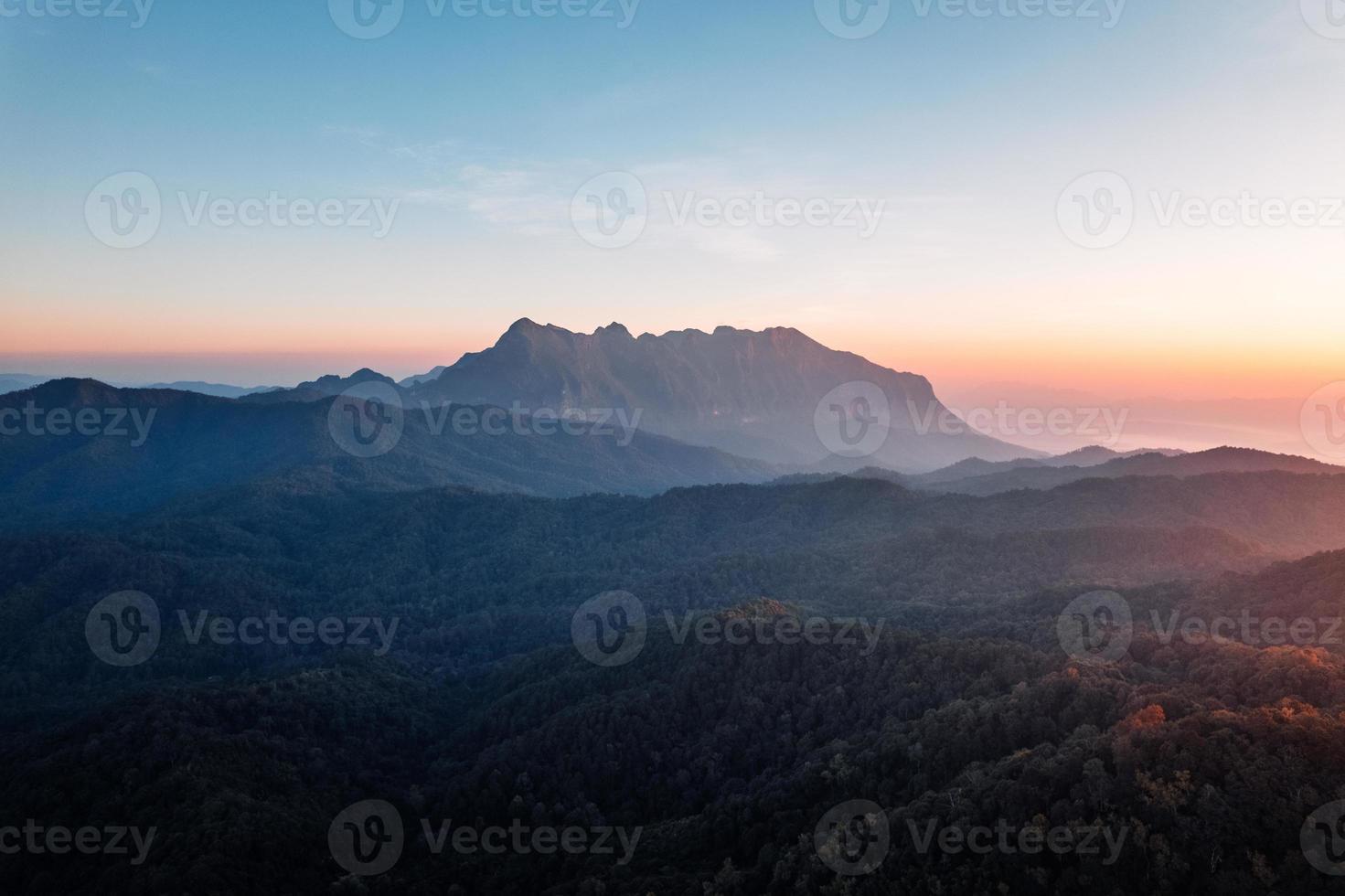 Mountains and forests in the morning photo