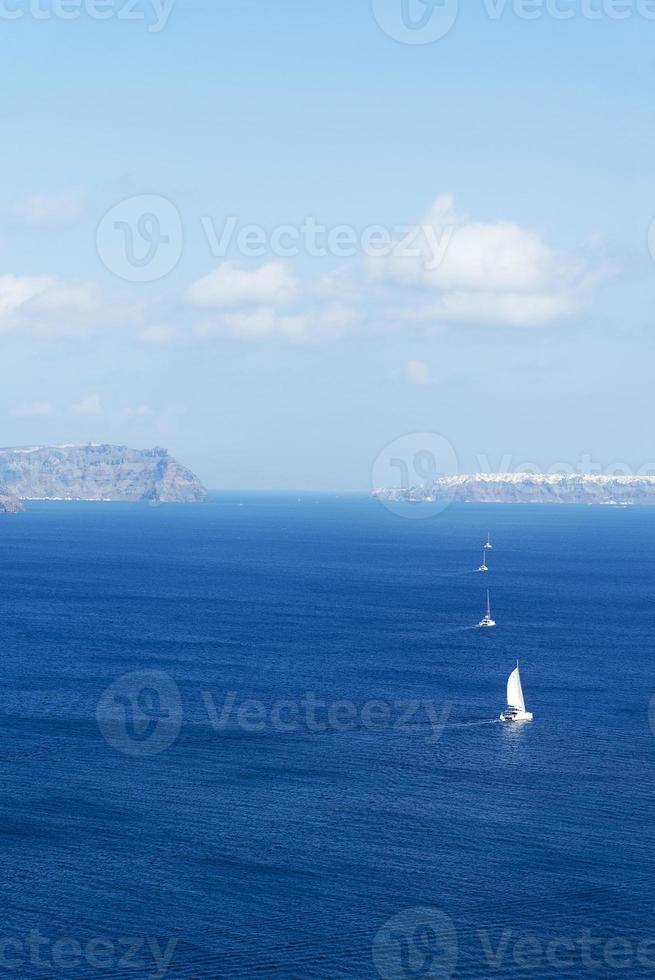 Sweeping landscape overlooking the island of Santorini, Greece photo