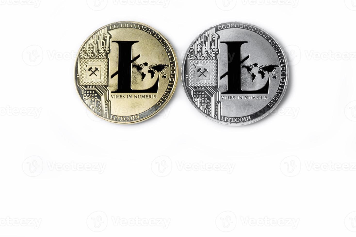 Hand holds one Litecoin on a white background. photo