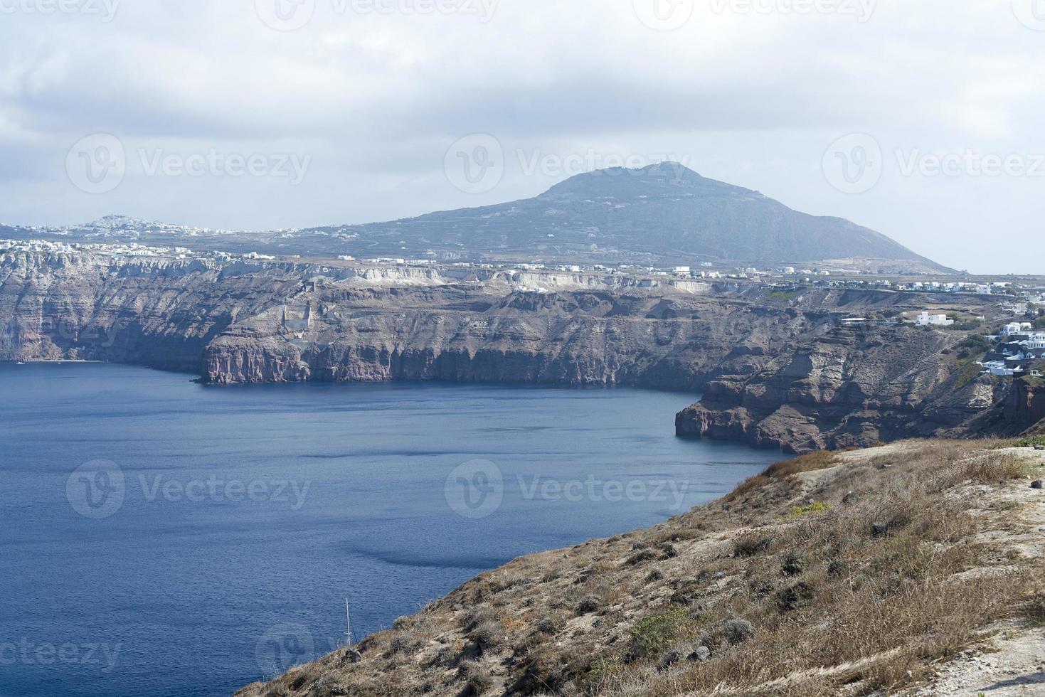 Sweeping landscape overlooking the island of Santorini, Greece photo