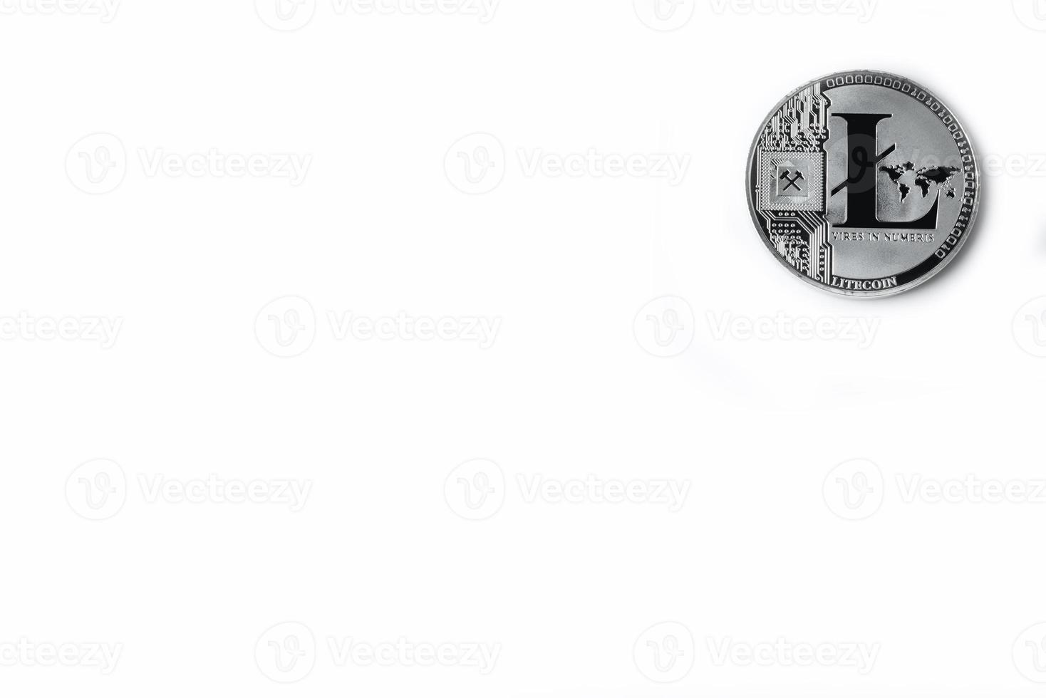 Silver colored coin Litecoins - international virtual cryptocurrency. photo