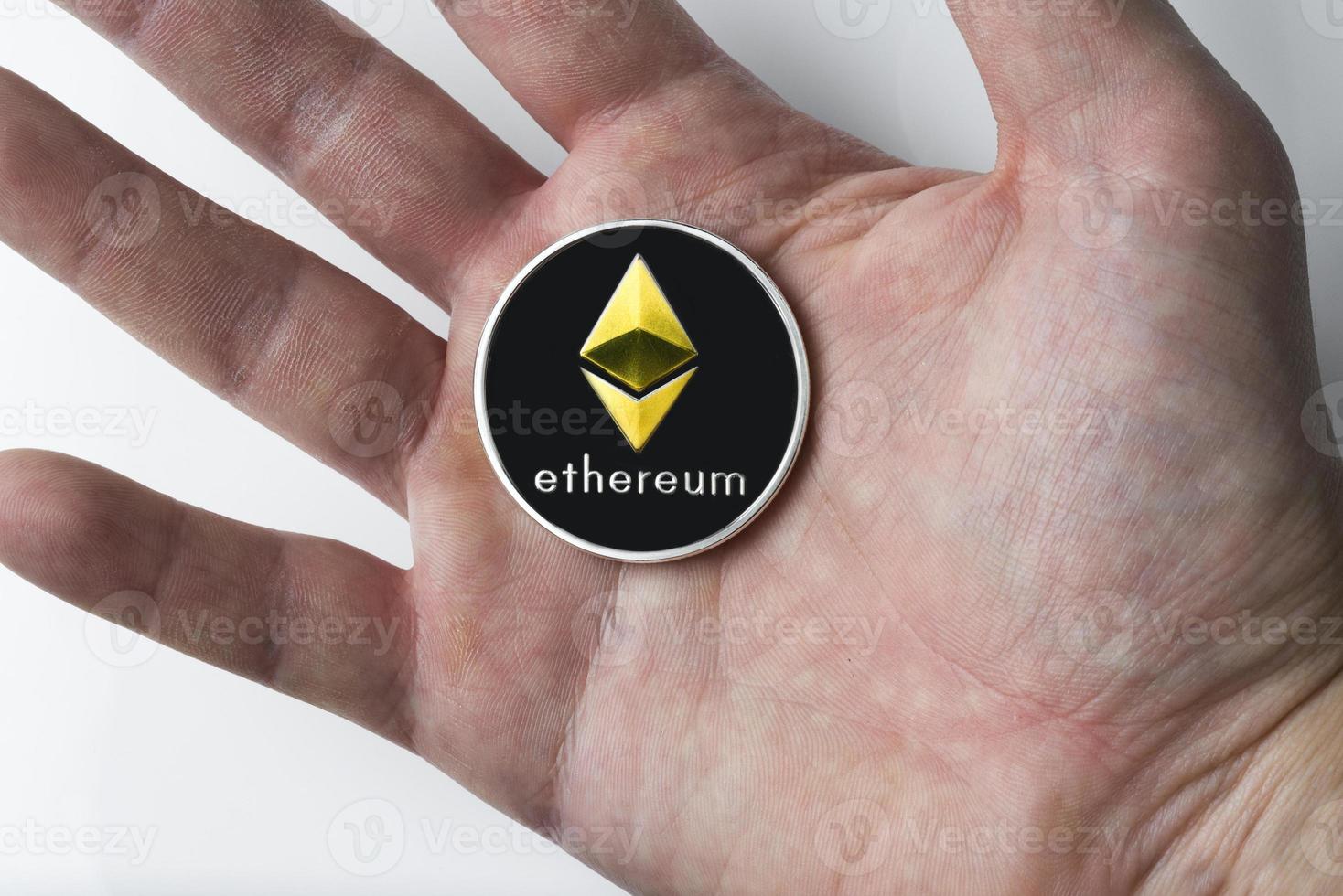 Single Real coin of cryptocurrency Silver Ethereum isolated on white background photo