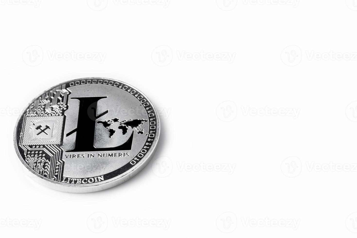 Silver colored coin Litecoins - international virtual cryptocurrency. photo