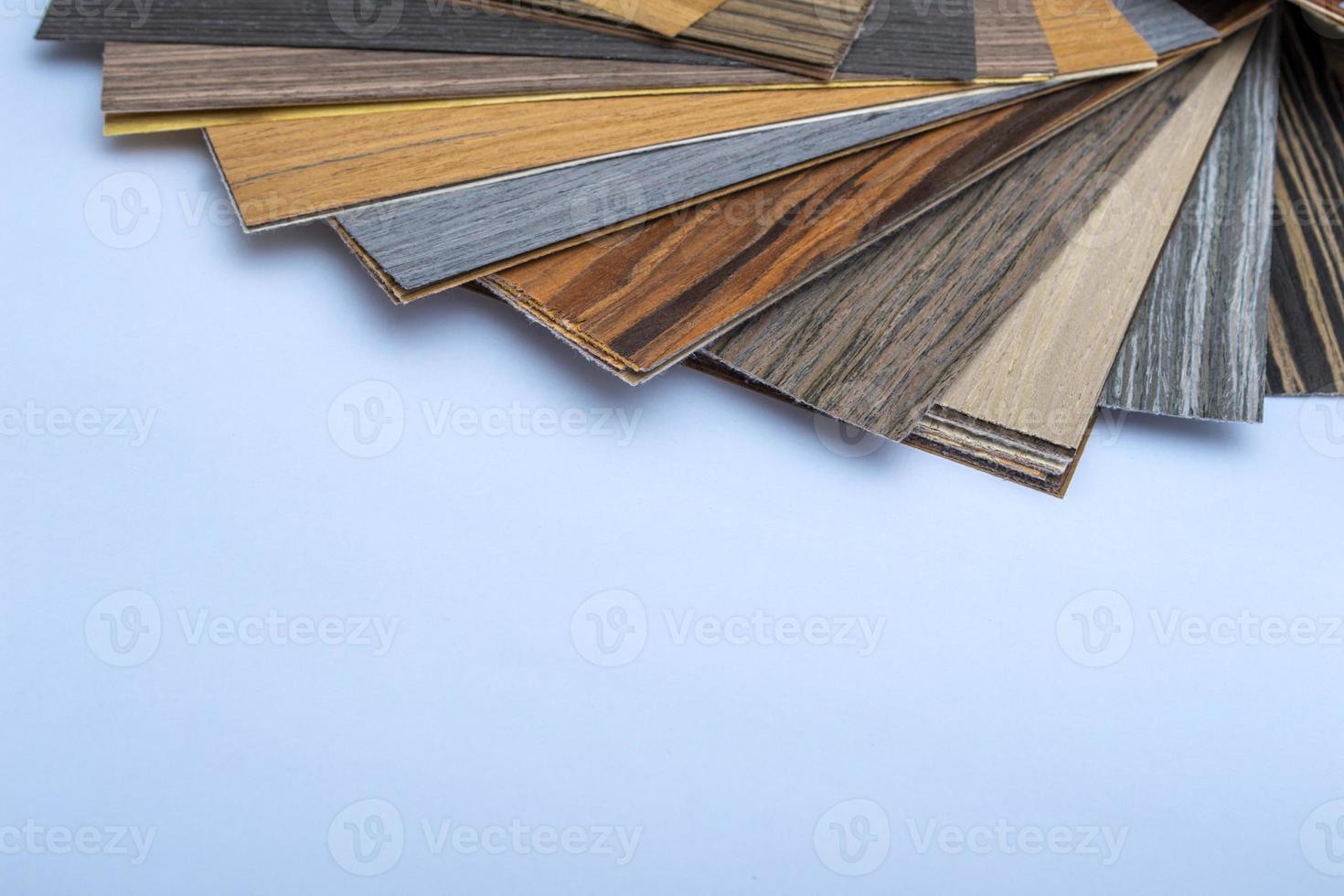 A thin sheaf of wood. Lots of samples. Interior design industry. Close up copy space. photo