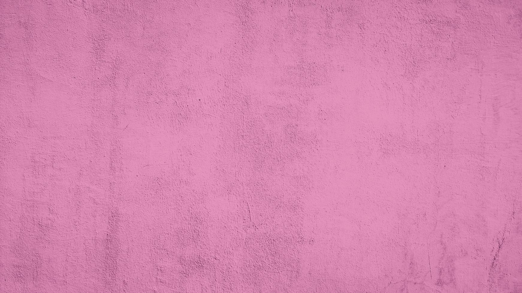 abstract cement concrete wall texture background with pink color photo