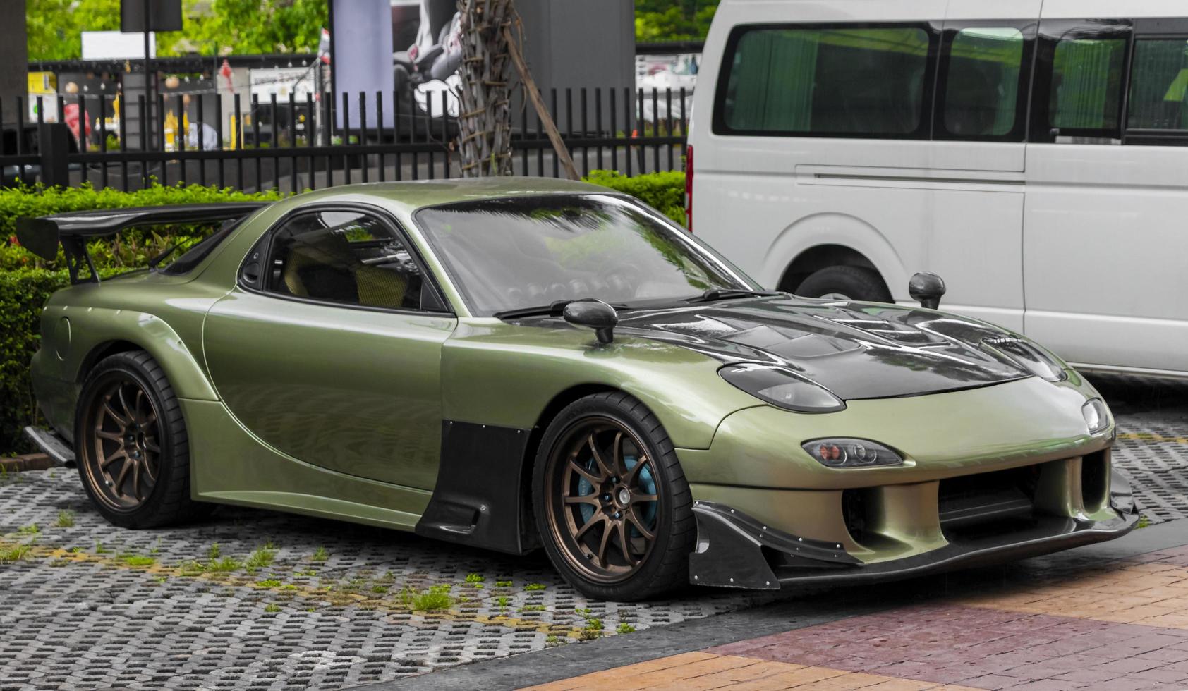 Bangkok Thailand 22. May 2018 Green tuned sports car parked in Bangkok Thailand. photo