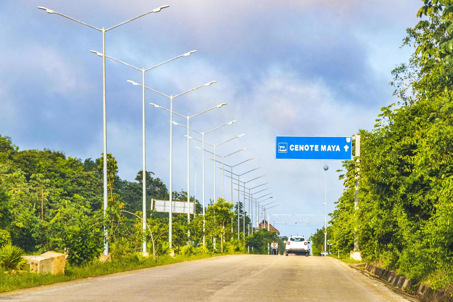 Driving on highway freeway motorway in jungle tropical nature Mexico. photo