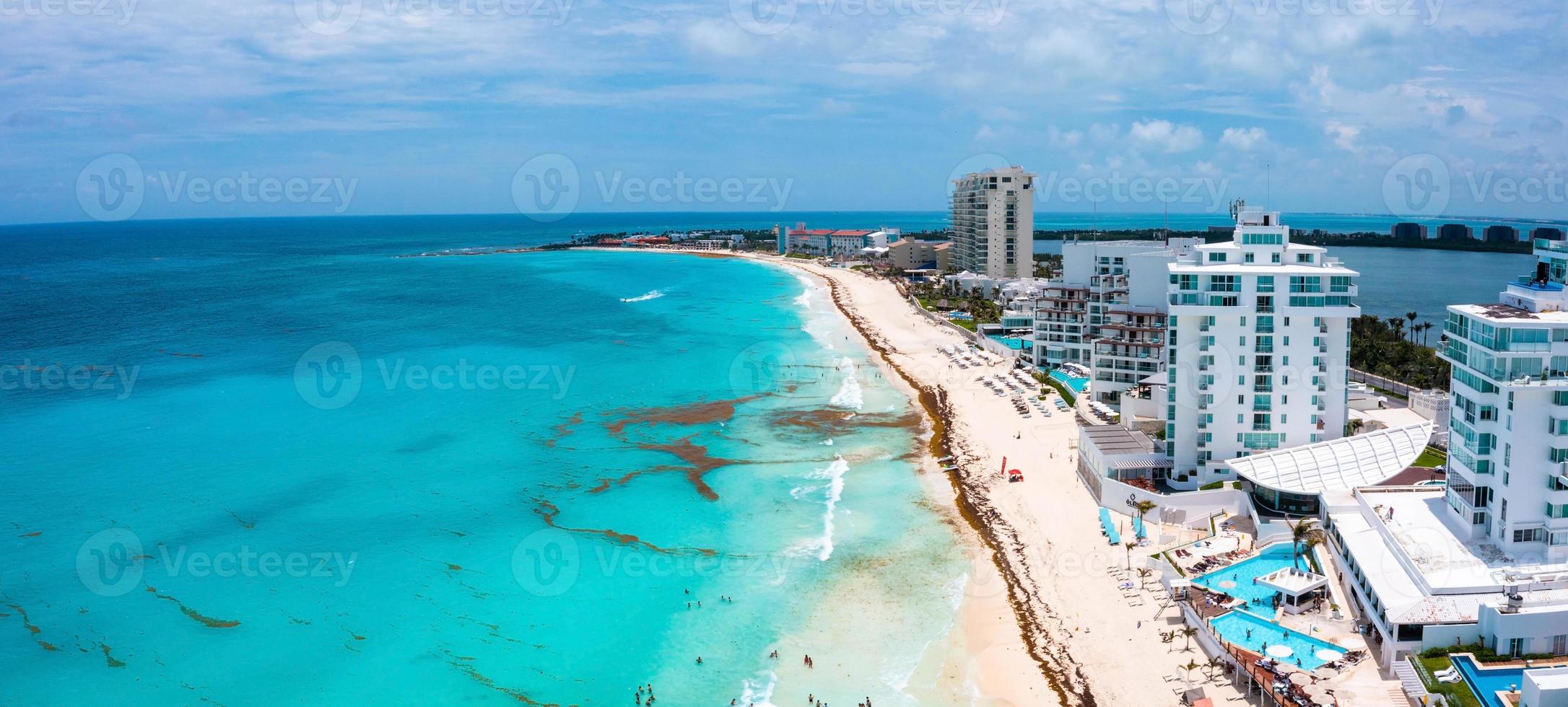 Flying over beautiful Cancun beach area. photo