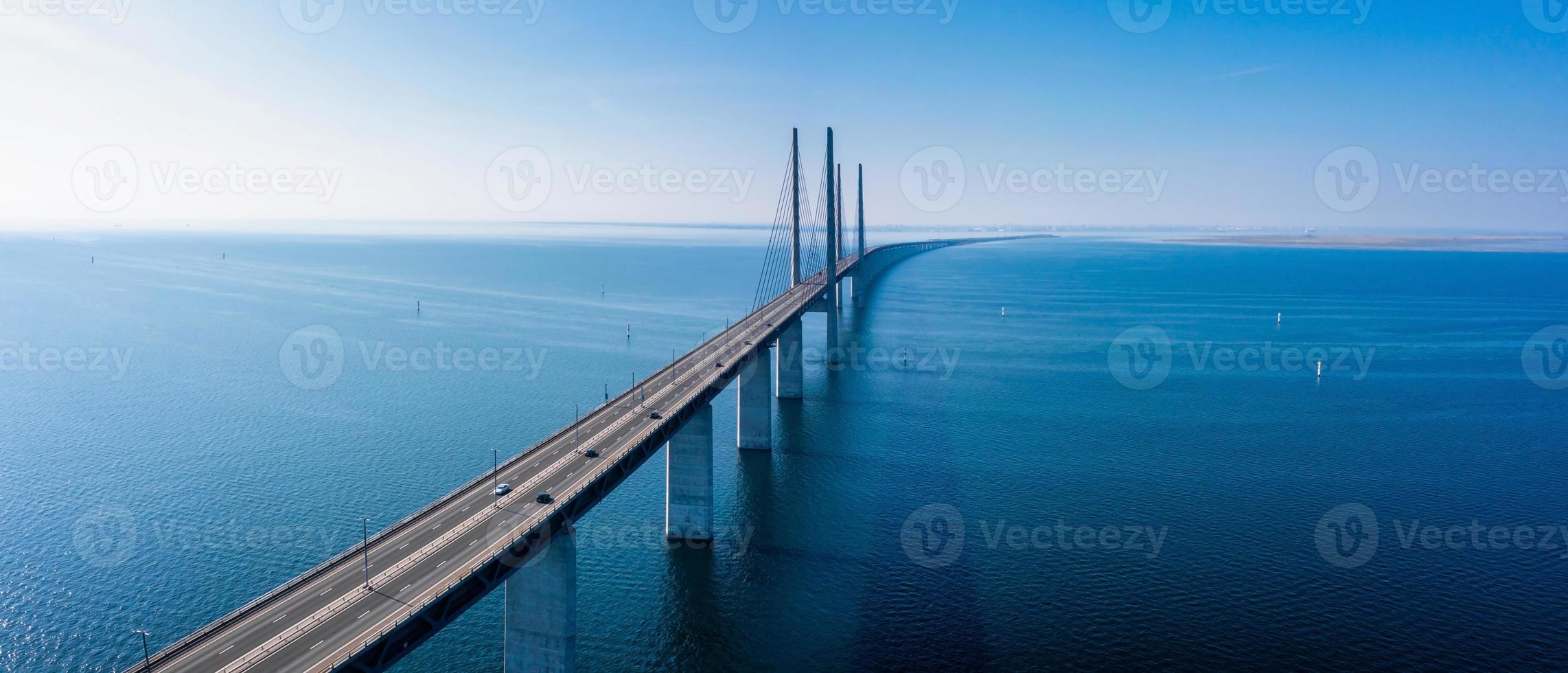 Panoramic aerial view of the Oresundsbron bridge between Denmark and Sweden. Oresund Bridge view at sunset photo