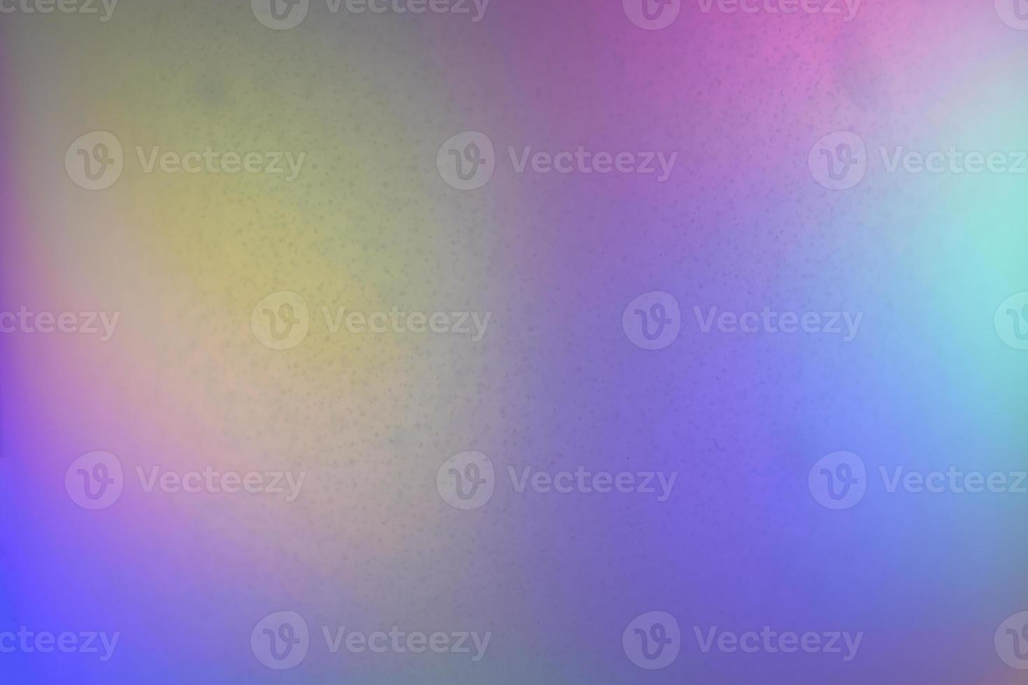 Multicolored background gradient glitter lamp close up photo