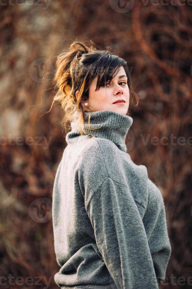 women in gray sweater photo