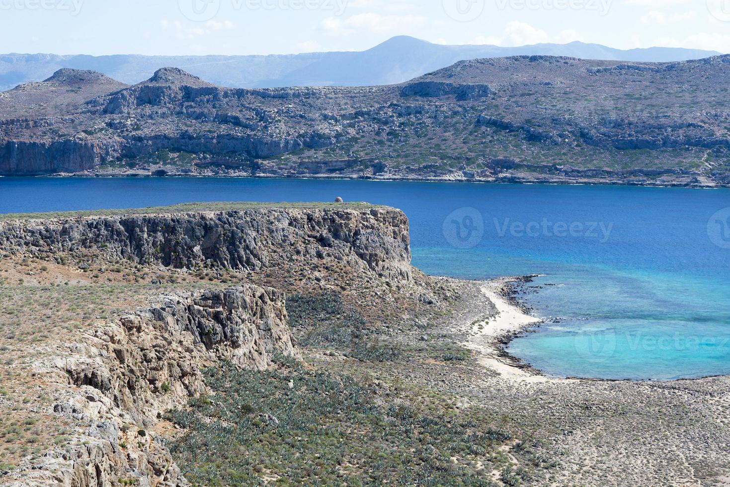 The view of the beach, the mountains and the sea. photo