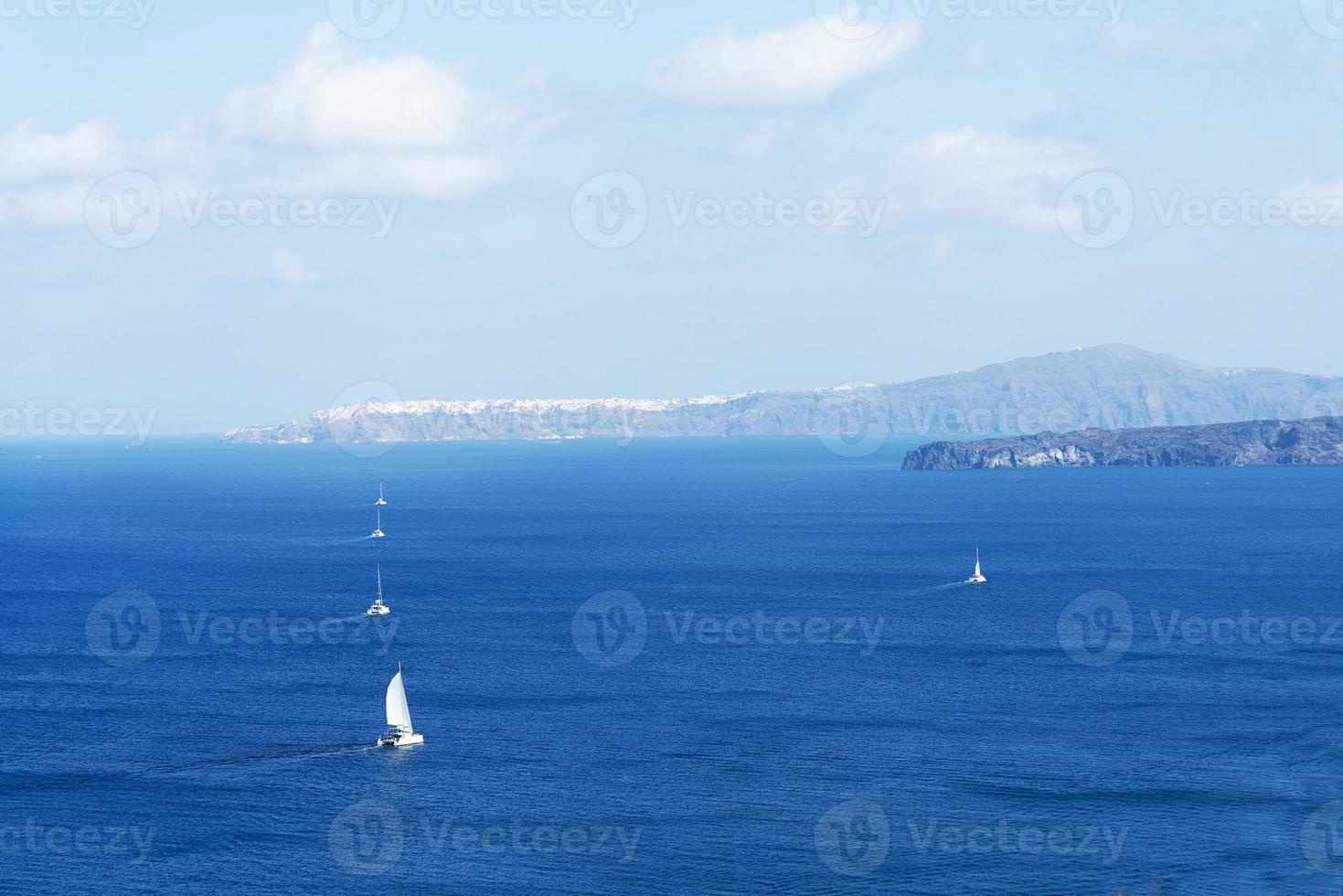 Sweeping landscape overlooking the island of Santorini, Greece photo