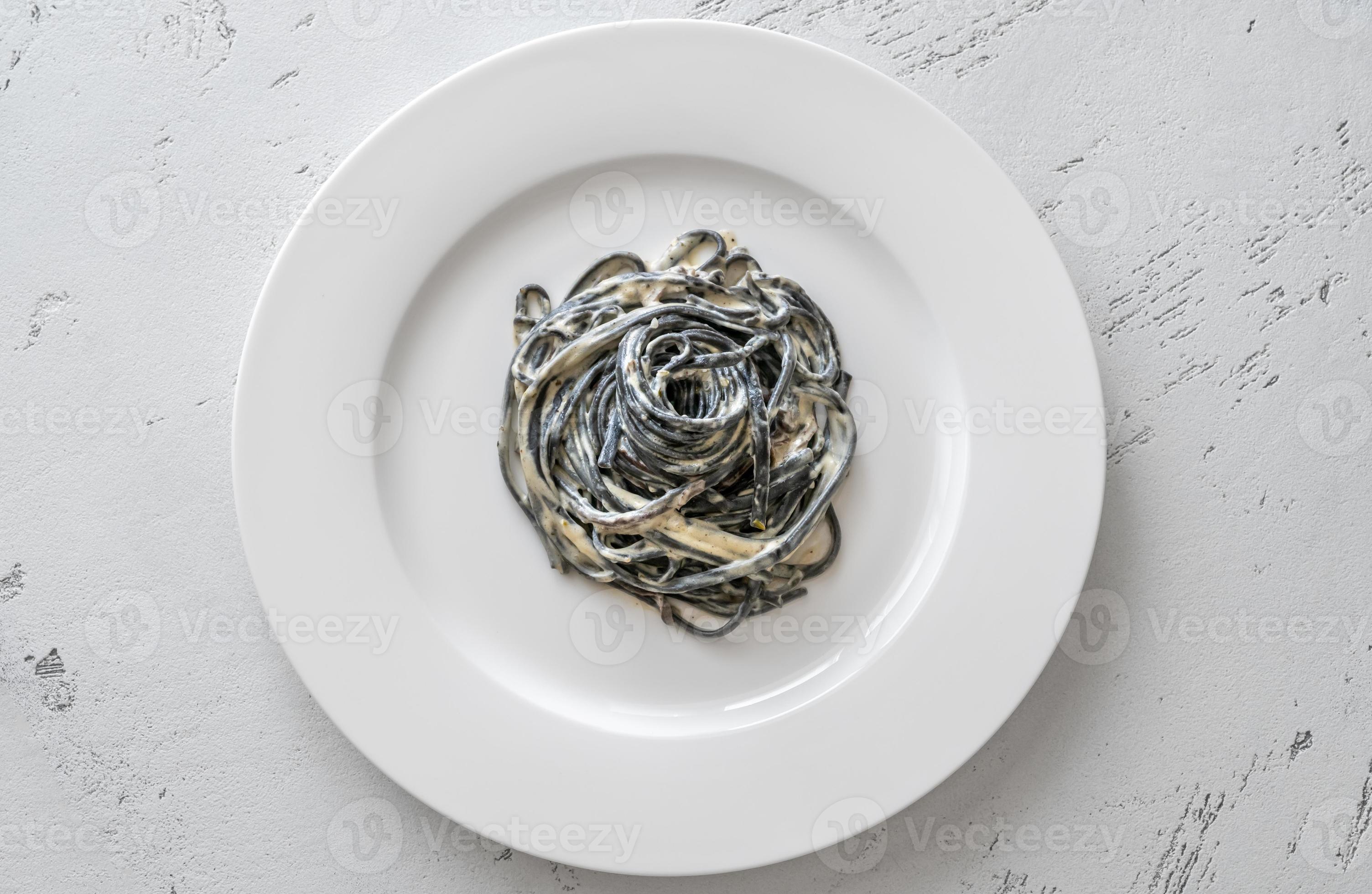 Squid Ink Pasta With Creamy Sauce 5126998 Stock Photo At Vecteezy squid-ink-pasta-with-creamy-sauce-5126998-stock-photo-at-vecteezy