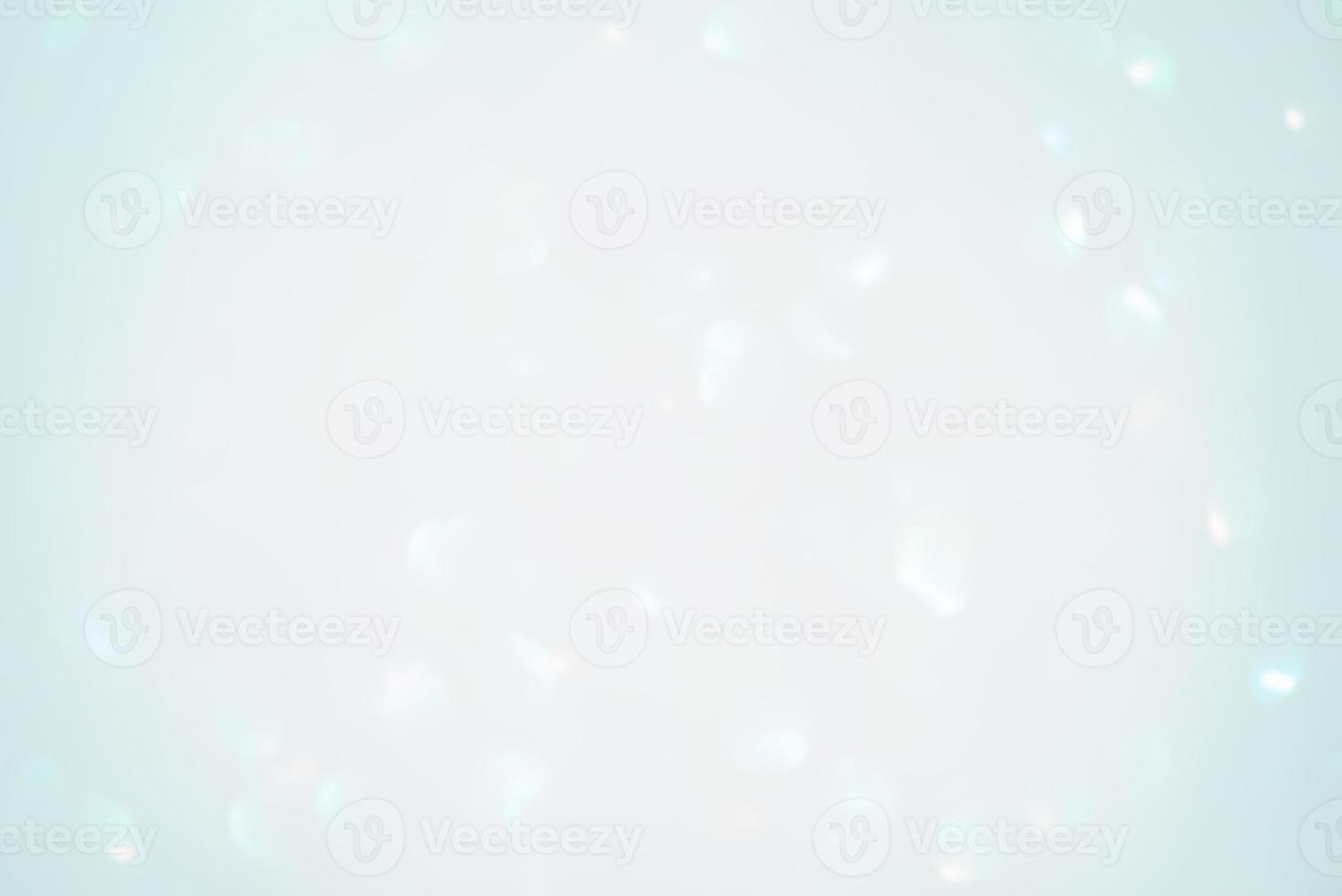 Defocus light blue sparkles glitter. Abstract background blur focus. photo