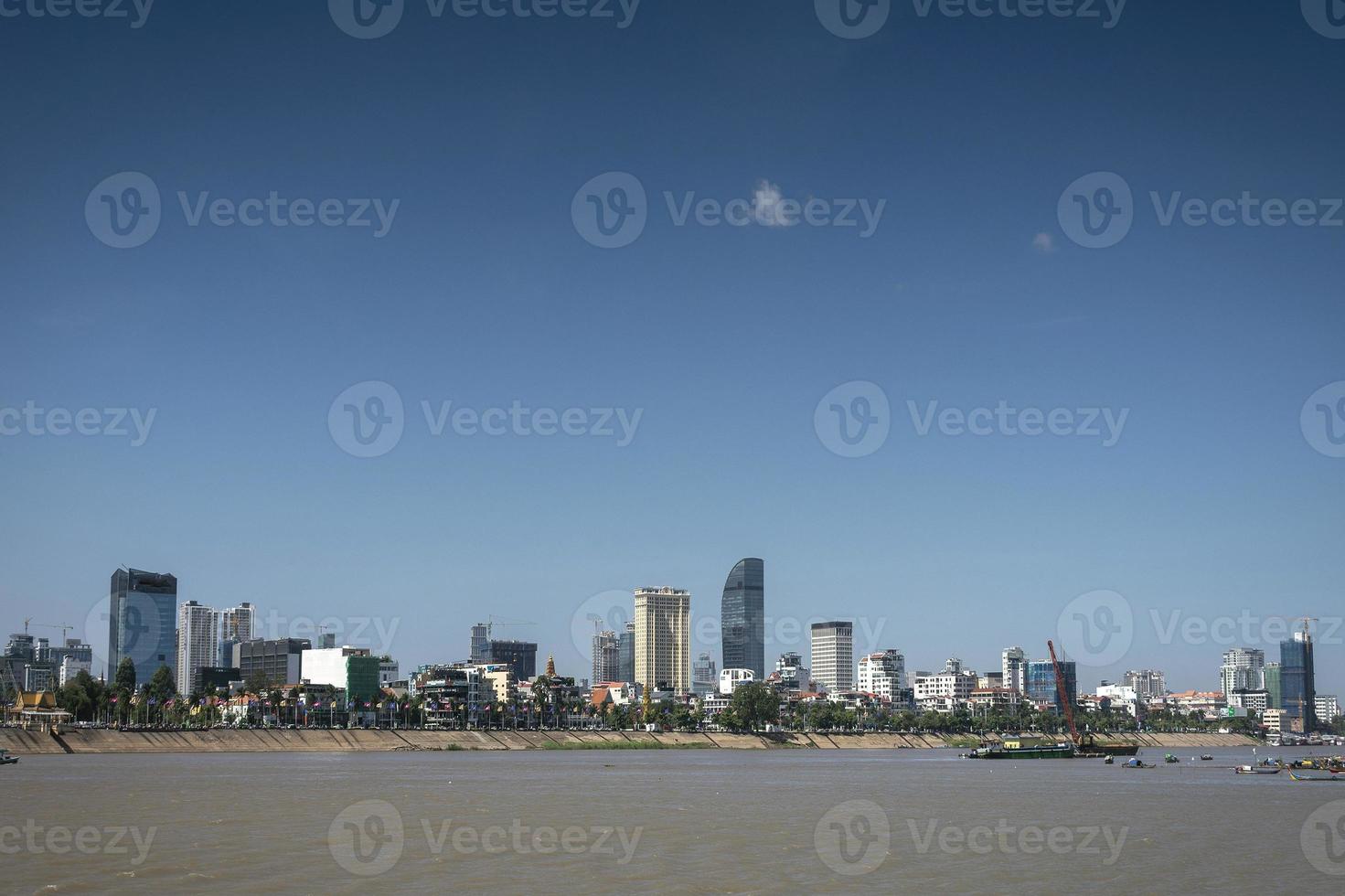 Phnom Penh city riverside skyline modern buildings in Cambodia photo
