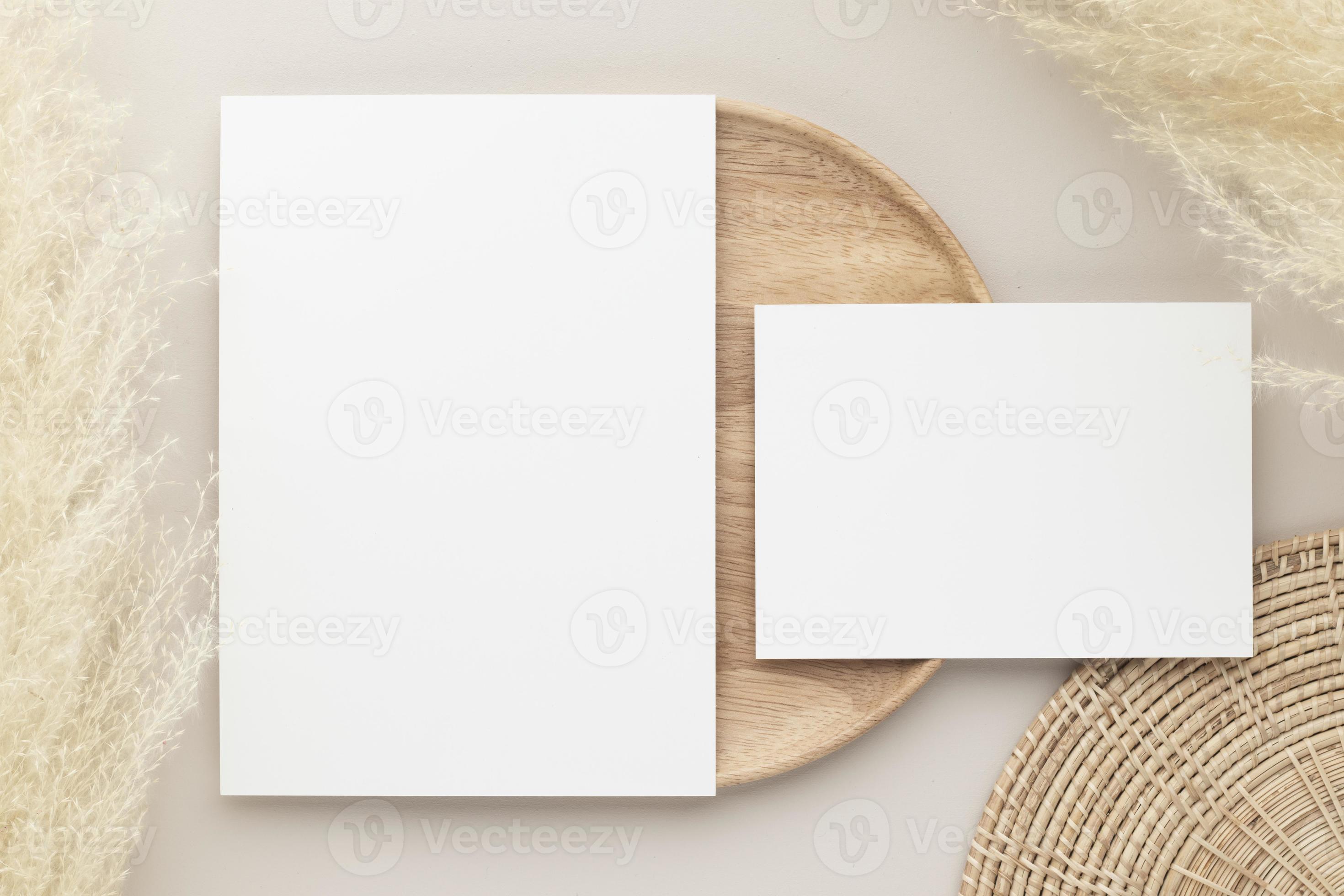 Blank paper cards, Mockup with pampas grass on a wooden plate, beige