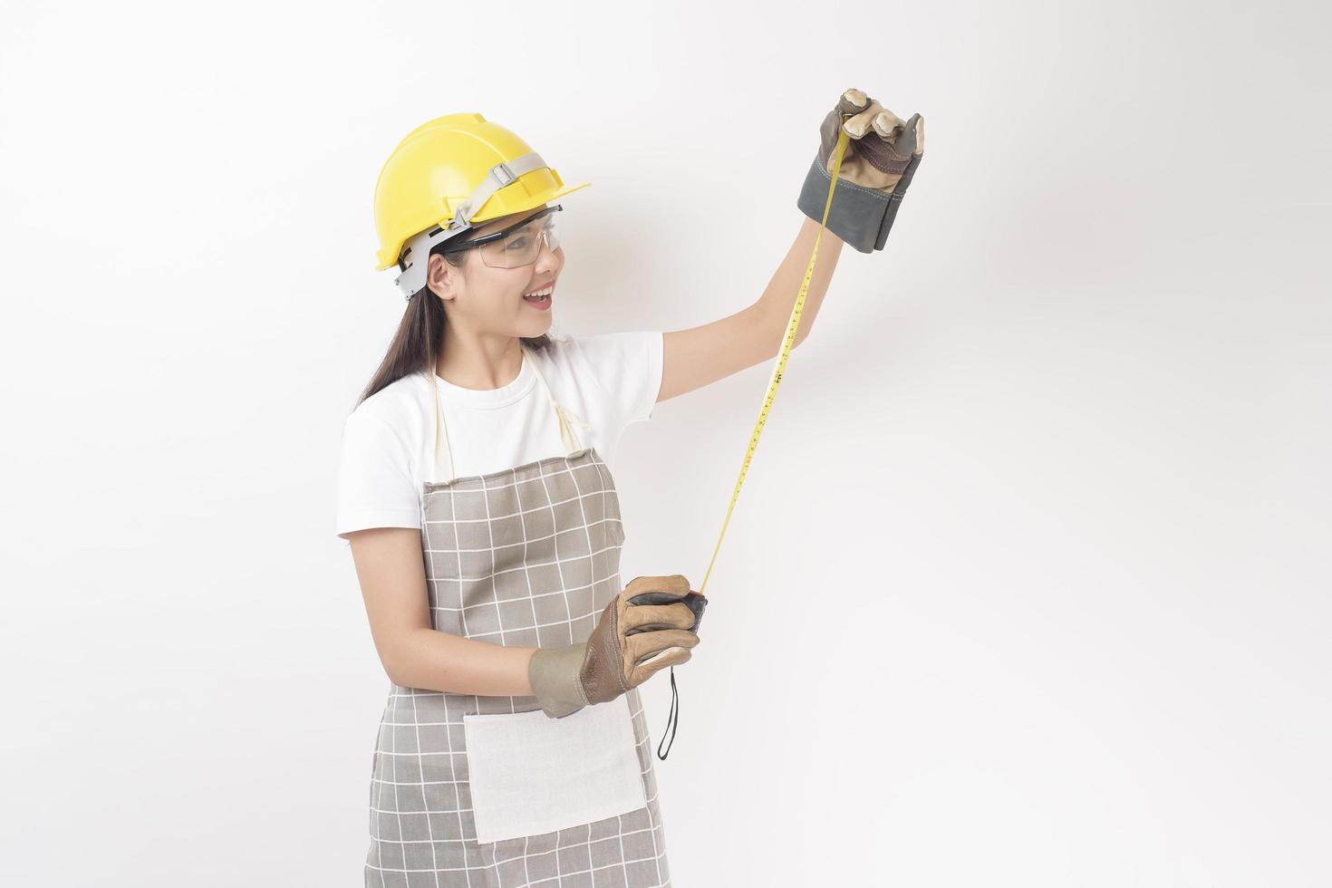 woman technician portrait on white background photo