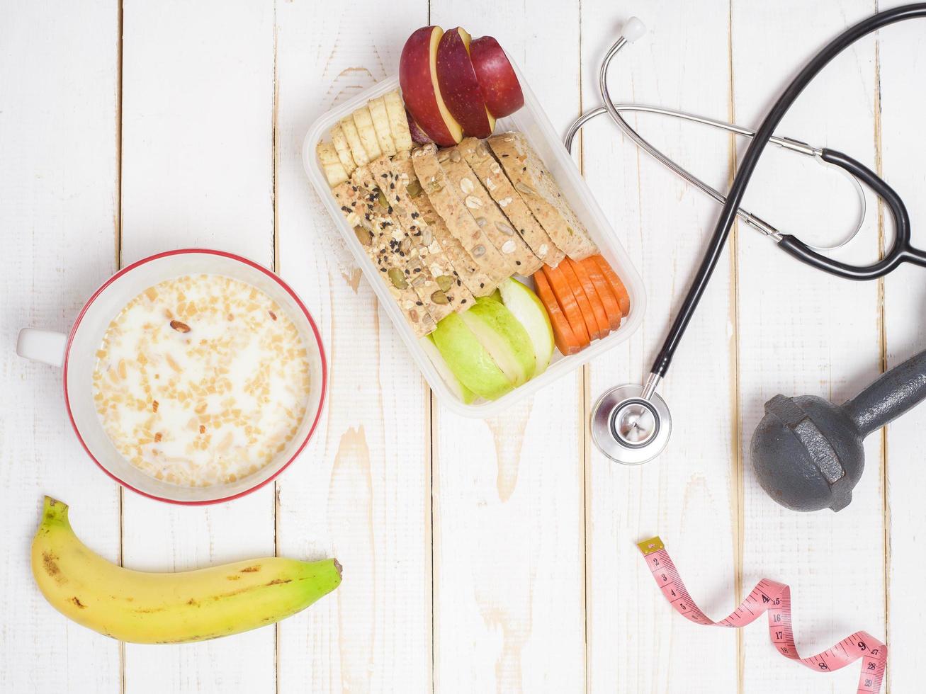 Diet food for healthy eating on white wooden  background photo