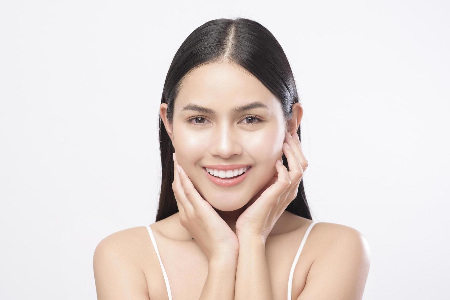 Portrait of young beautiful woman with smooth healthy skin on white background , Skincare concept photo