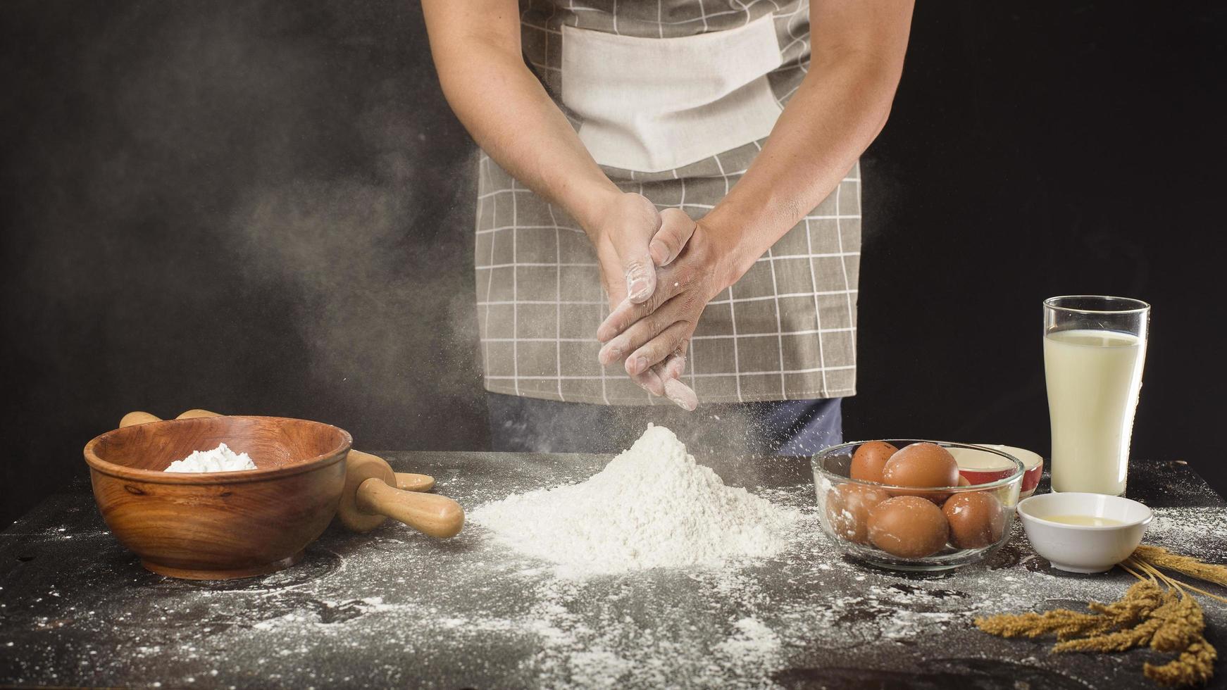 A man is baking homemade bakery photo