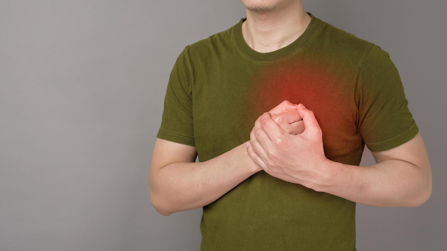 Young man With Heart Attack photo