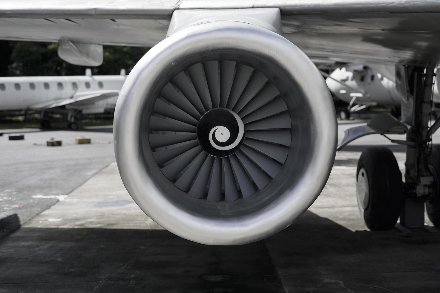 Close up of airplane engine in an airfield photo