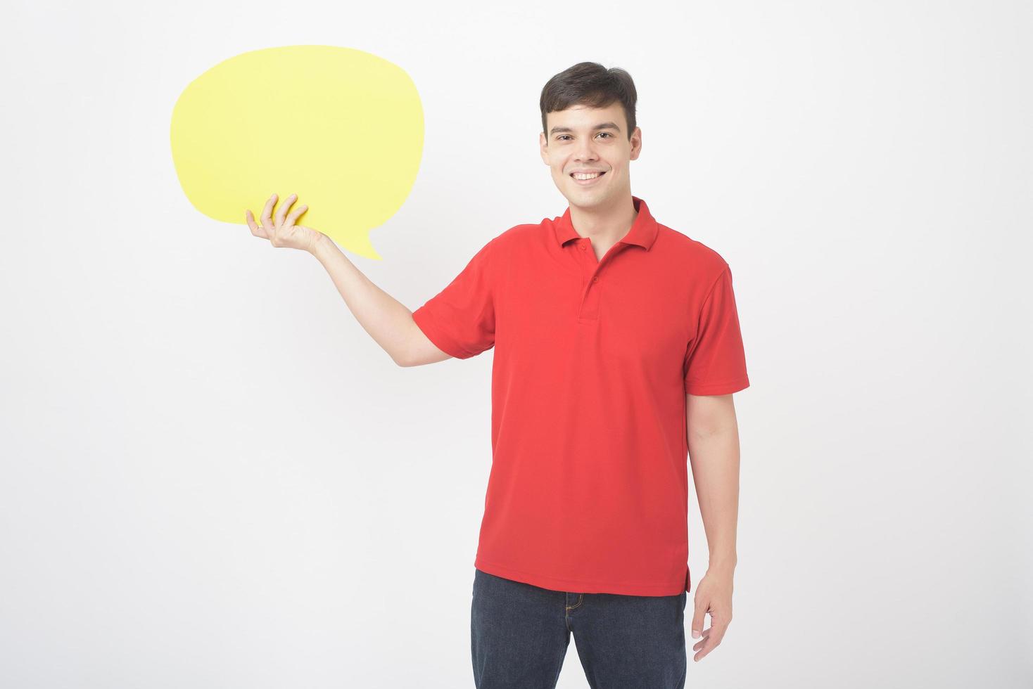 A Caucasian Middle aged Man is holding yellow empty speech on white background photo