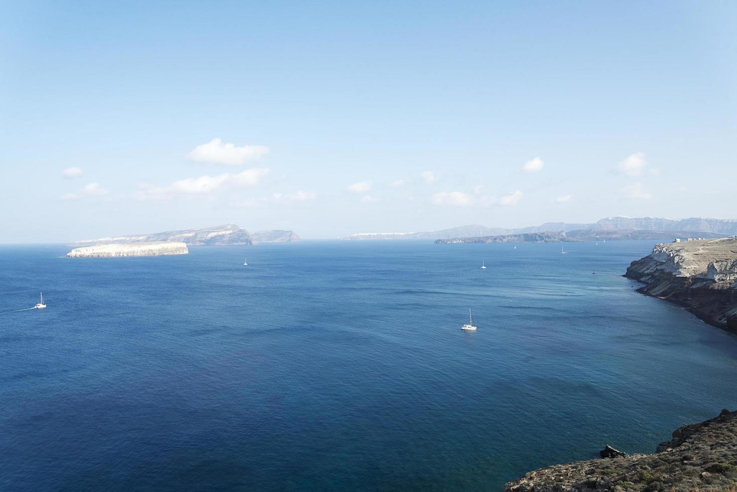 Sweeping landscape overlooking the island of Santorini, Greece photo