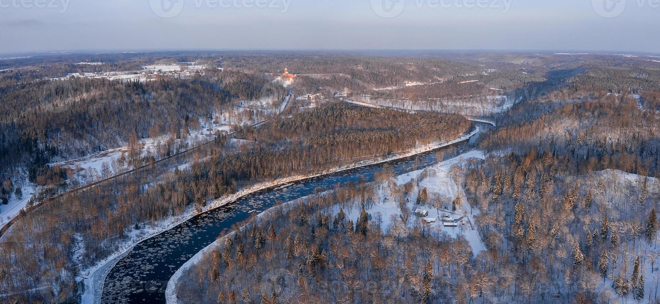 Winter in Sigulda, Latvia. River Gauja and Turaida Castle in background. photo