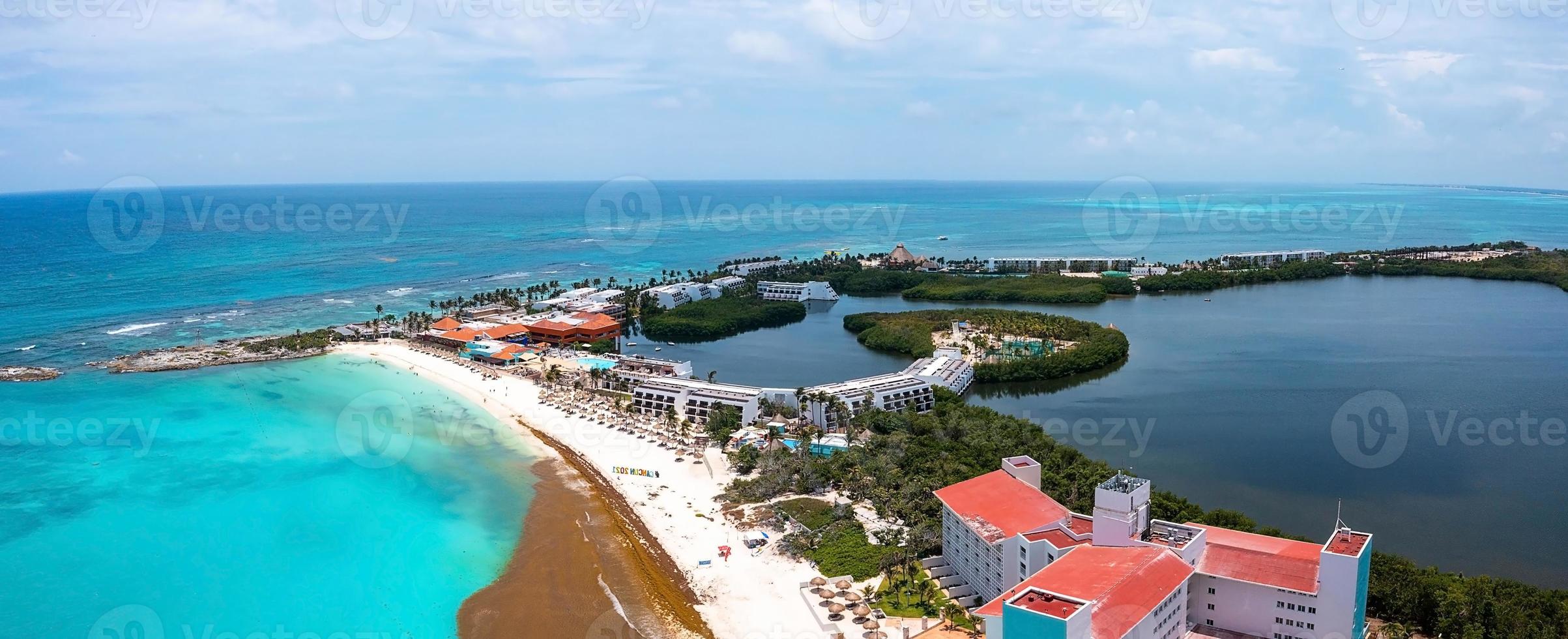 Flying over beautiful Cancun beach area. photo