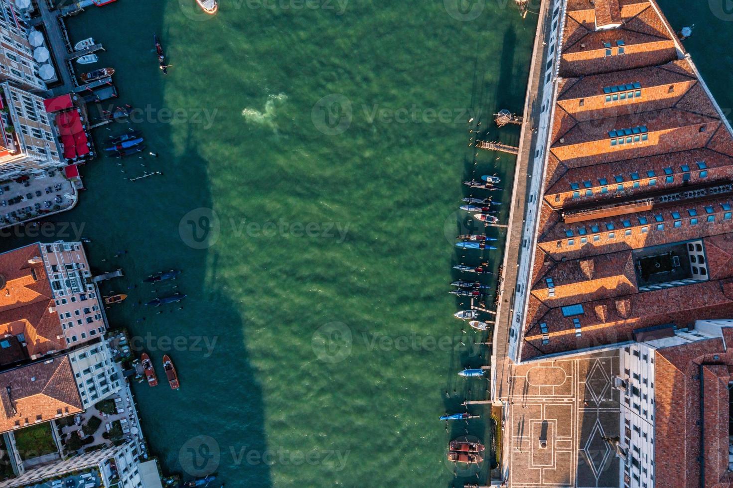 Top down view of moored empty venetian gondolas photo