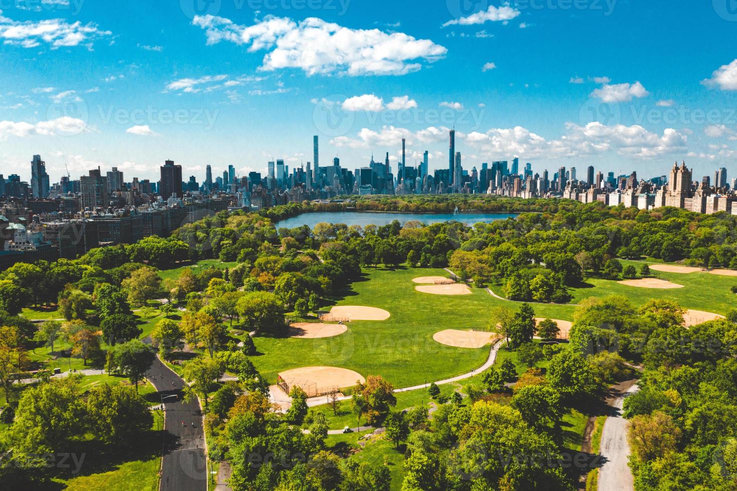 Central Park aerial view in Manhattan, New York. huge beautiful park is surrounded by skyscraper photo