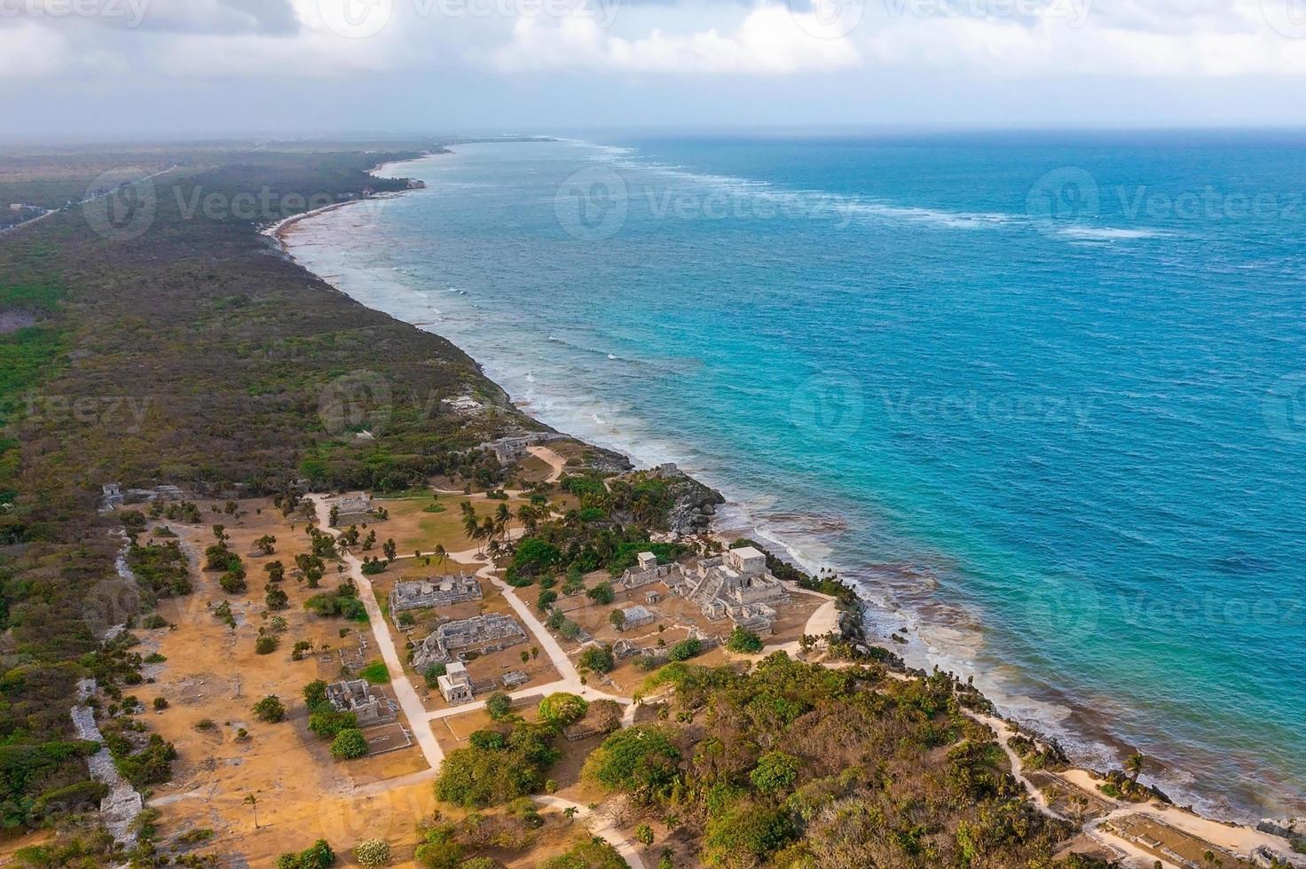 God of Winds Temple on turquoise Caribbean sea. Ancient Mayan ruins in Tulum, Mexico photo