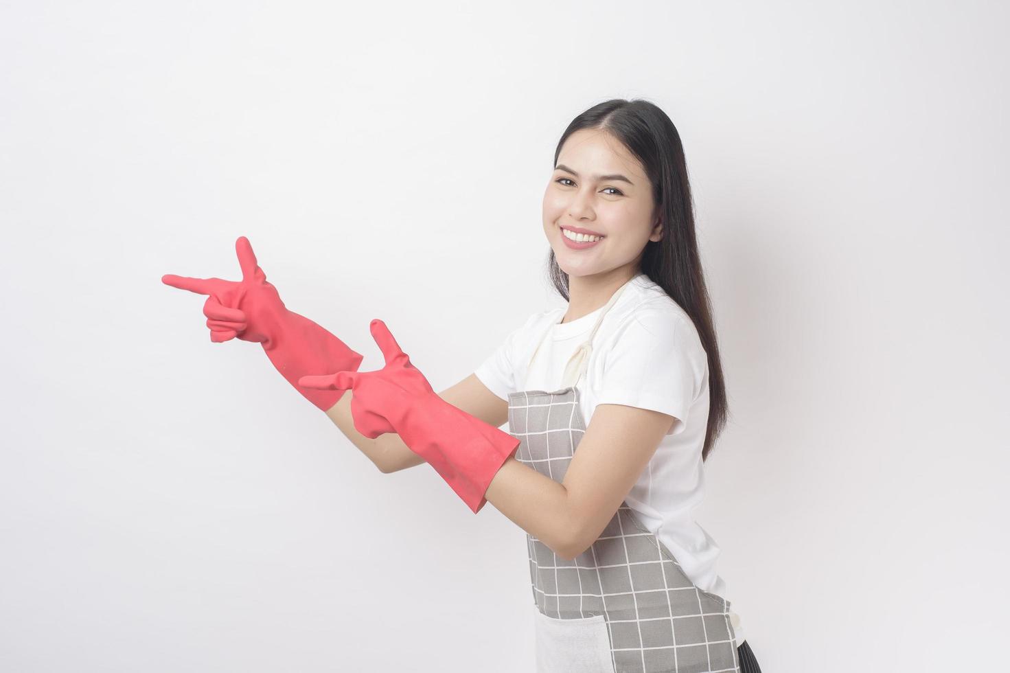 Beautiful woman housekeeper portrait on white background photo