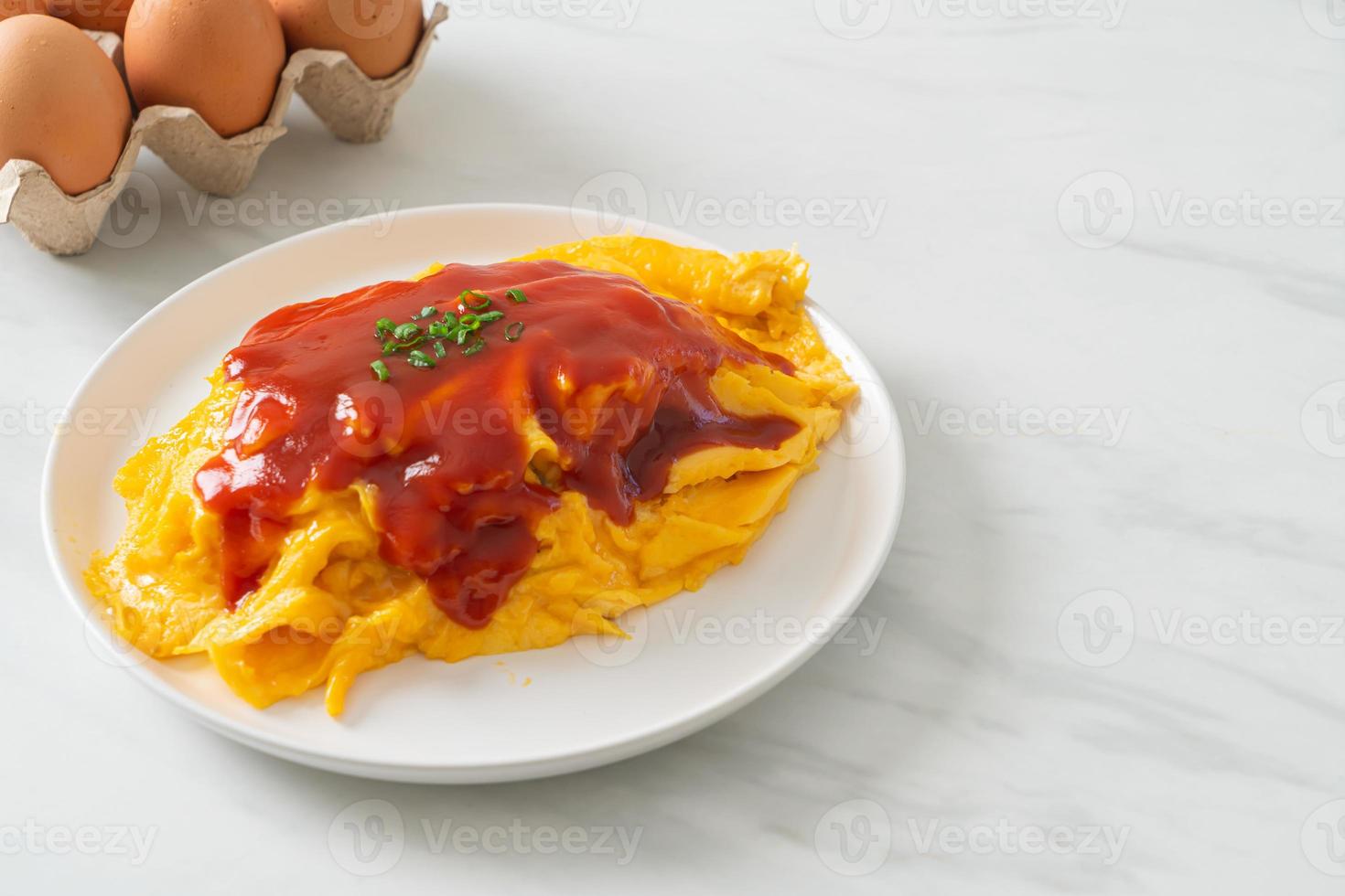 Flavored Fried Rice in an Omelet Wrapping photo