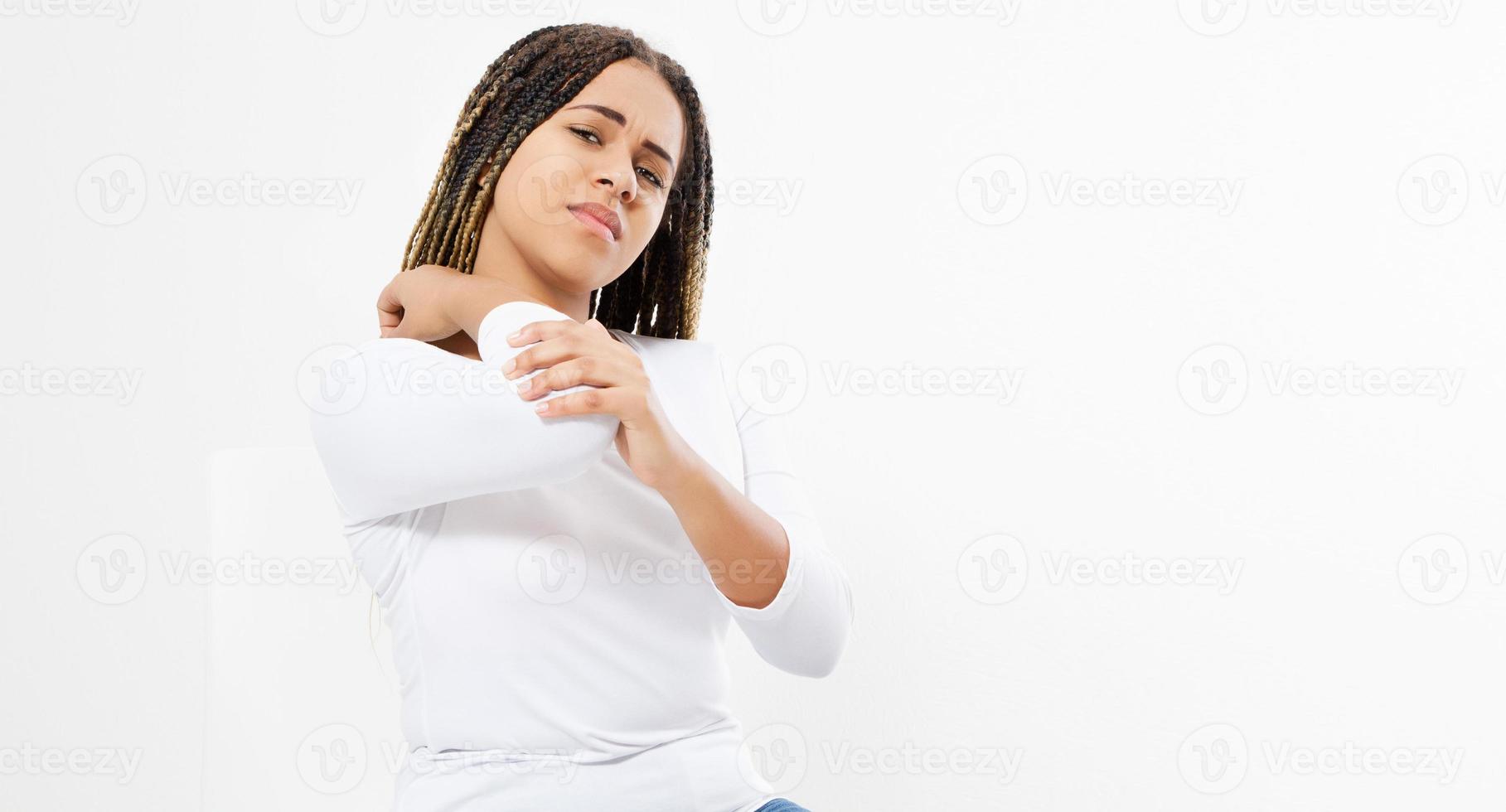 portrait of beautiful girl suffering from chronic joint rheumatism. Elbow pain and treatment concept, female pain suffer copy space photo