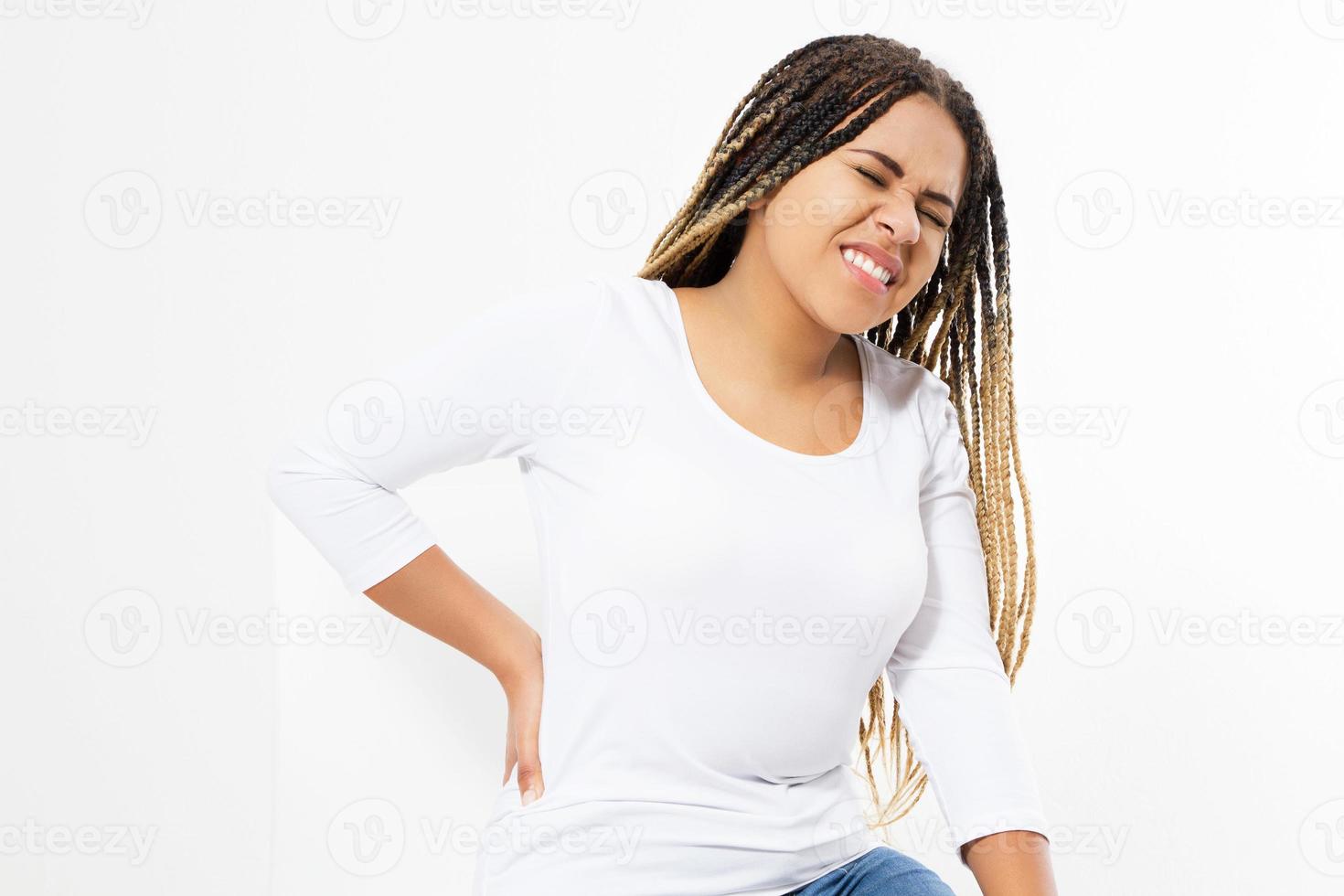 beautiful woman suffering from backache on chair - back view, female rheumatism copy space photo