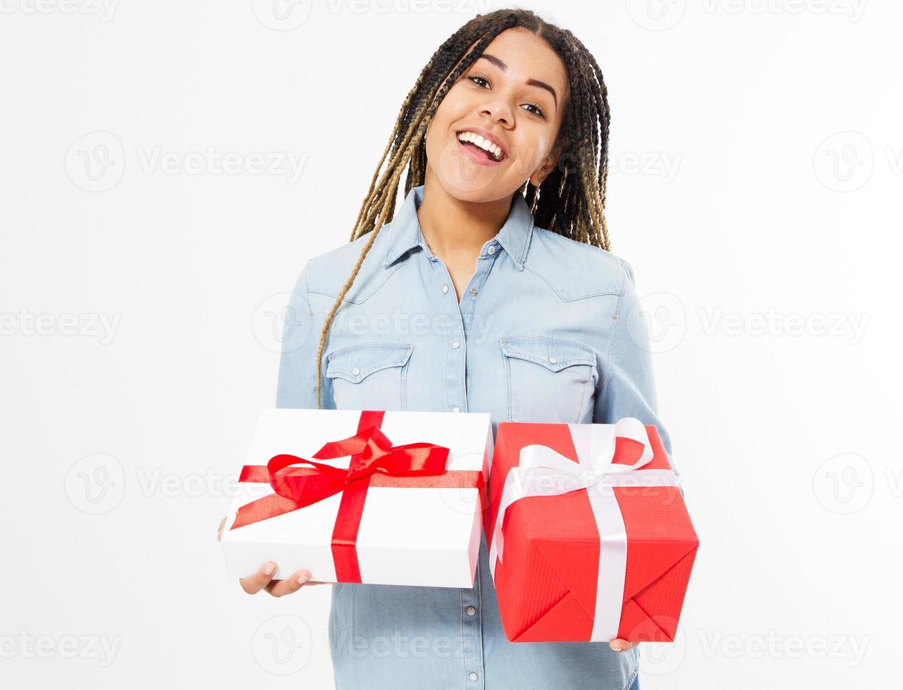 black afro american woman with dreadlocks holds gift boxes isolated photo