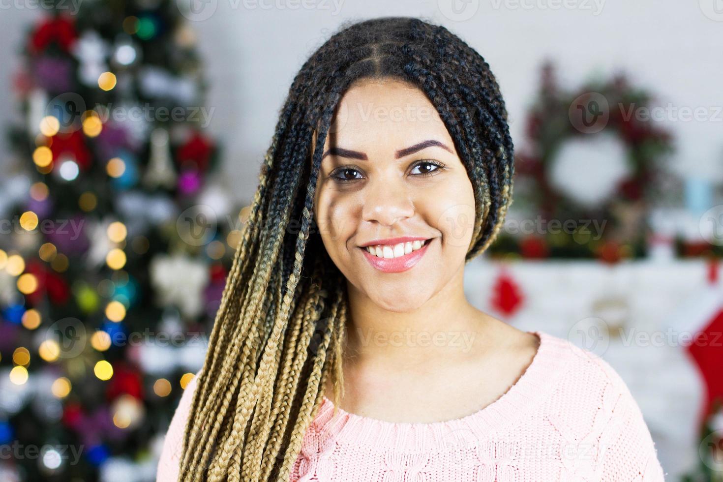 Close up happy beautiful woman on New Year Christmas background at home photo