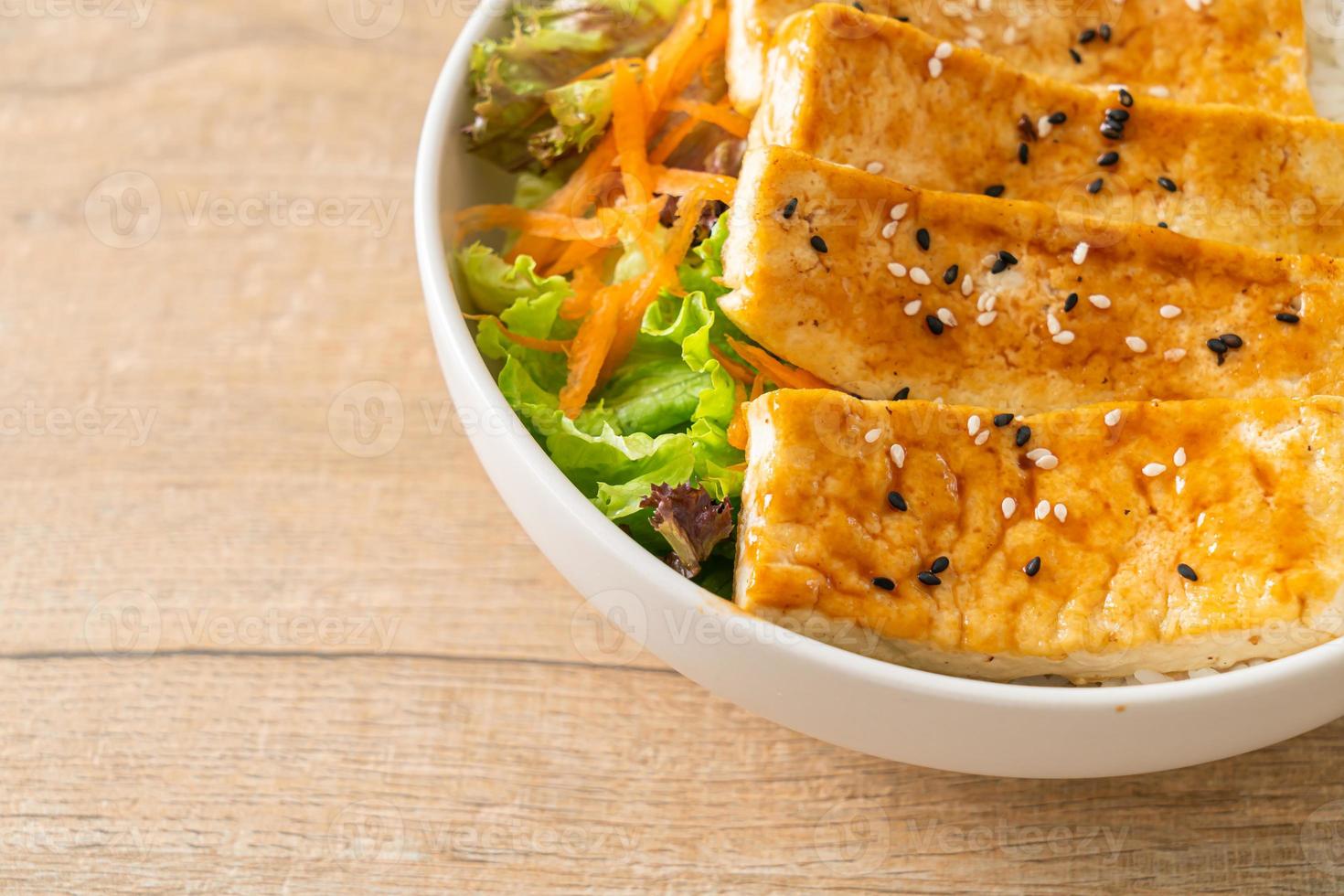 teriyaki tofu rice bowl - vegan food style photo