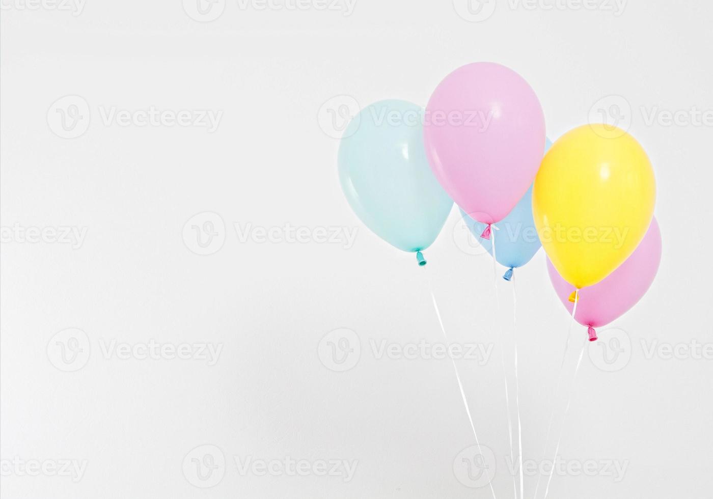 Colorful party balloons background. Isolated on white. Copy space photo