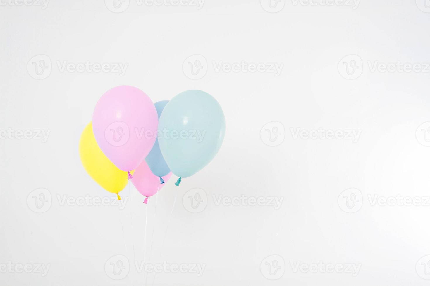 Colorful party balloons background. Isolated on white. Copy space photo